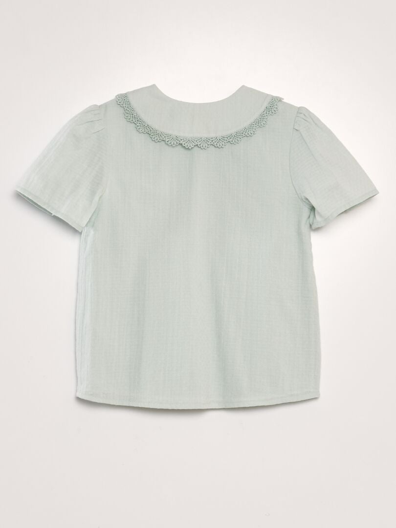 Blusa em tecido texturizado com gola claudine - azul