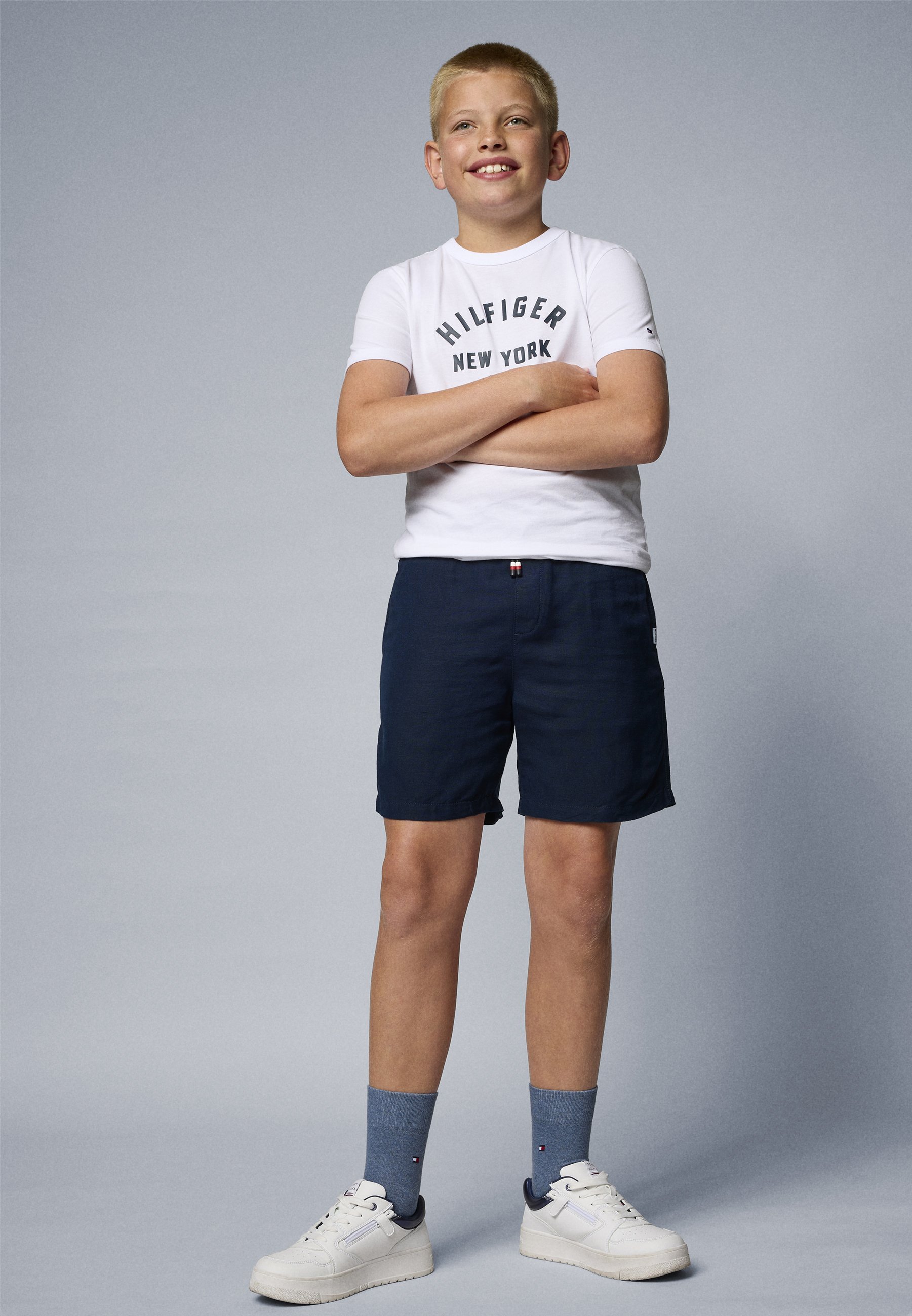 Tommy Hilfiger T-shirt met gebogen print, unisex - T-shirt met print - wit