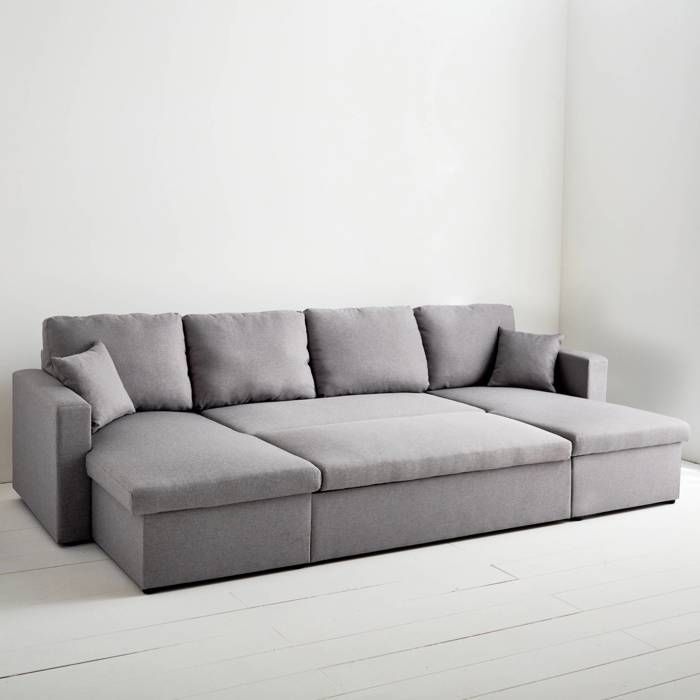 Sofá panorámico convertible en tela gris claro. 4 plazas. Compartimento de almacenamiento. Cama modular.