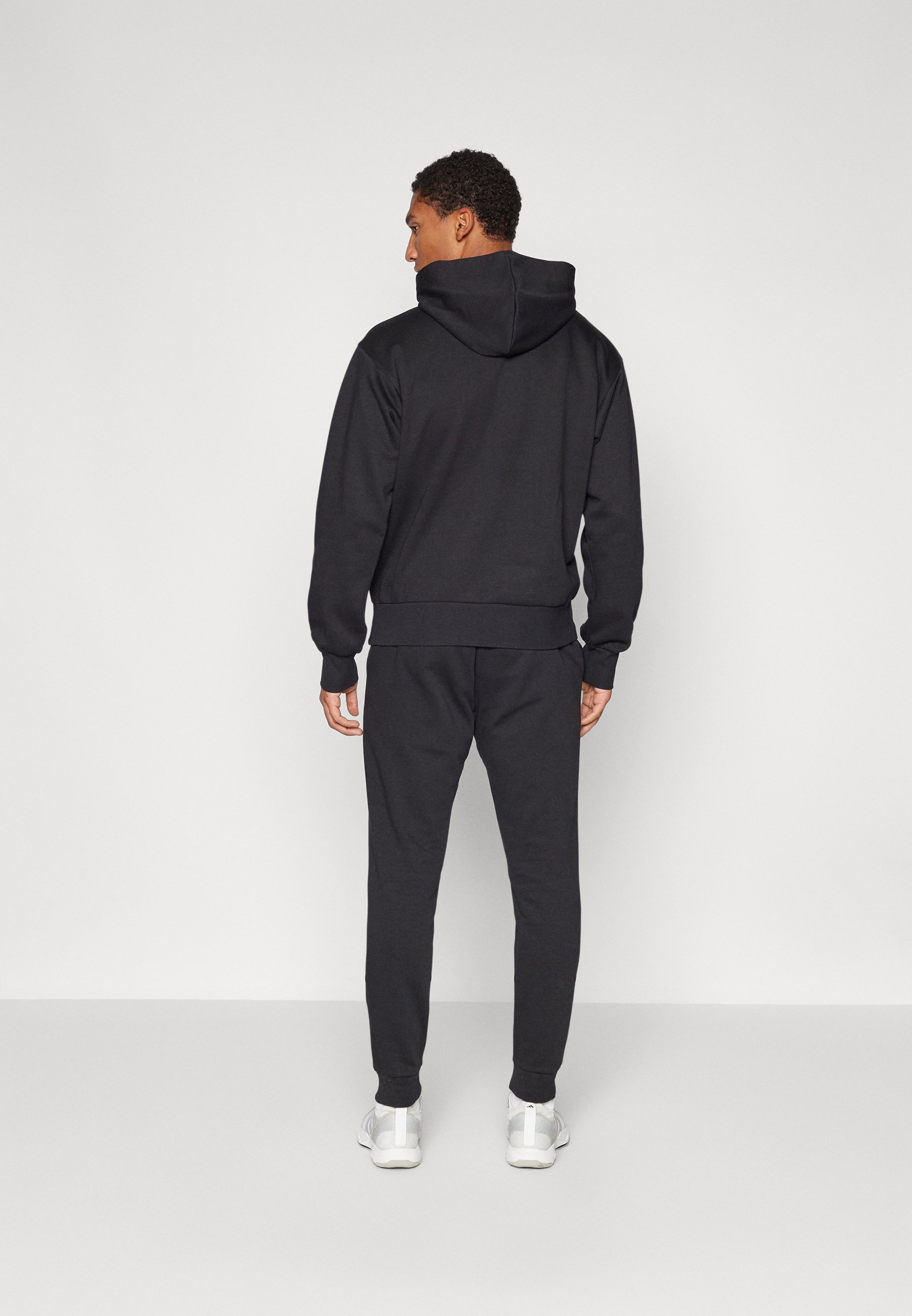 adidas Sportswear FEELCOZY - Trainingsbroek - zwart/wit