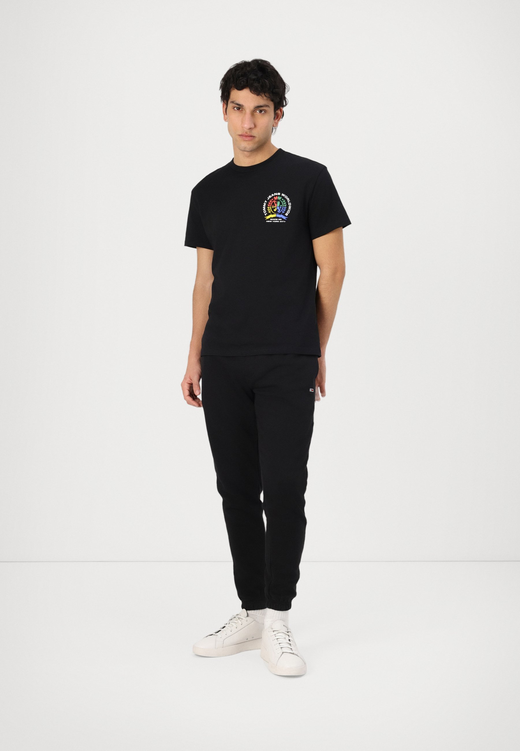 Pantalon de survêtement Tommy Jeans TJM SLIM S FLAG - noir