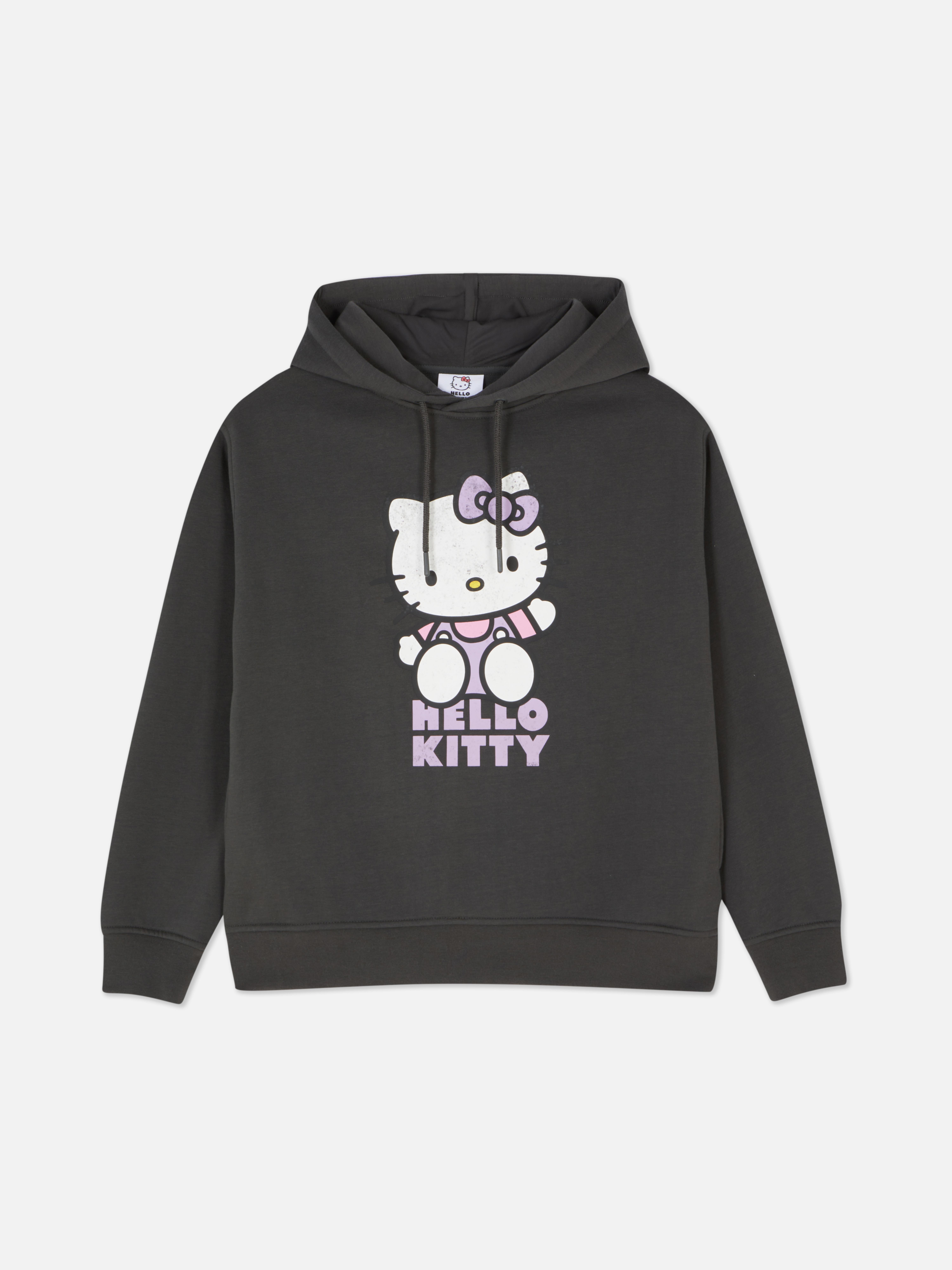 Ασορτί φούτερ με κουκούλα με τον χαρακτήρα Hello Kitty. Ένα φαρδύ φούτερ Hello Kitty με τύπωμα χαρακτήρα.