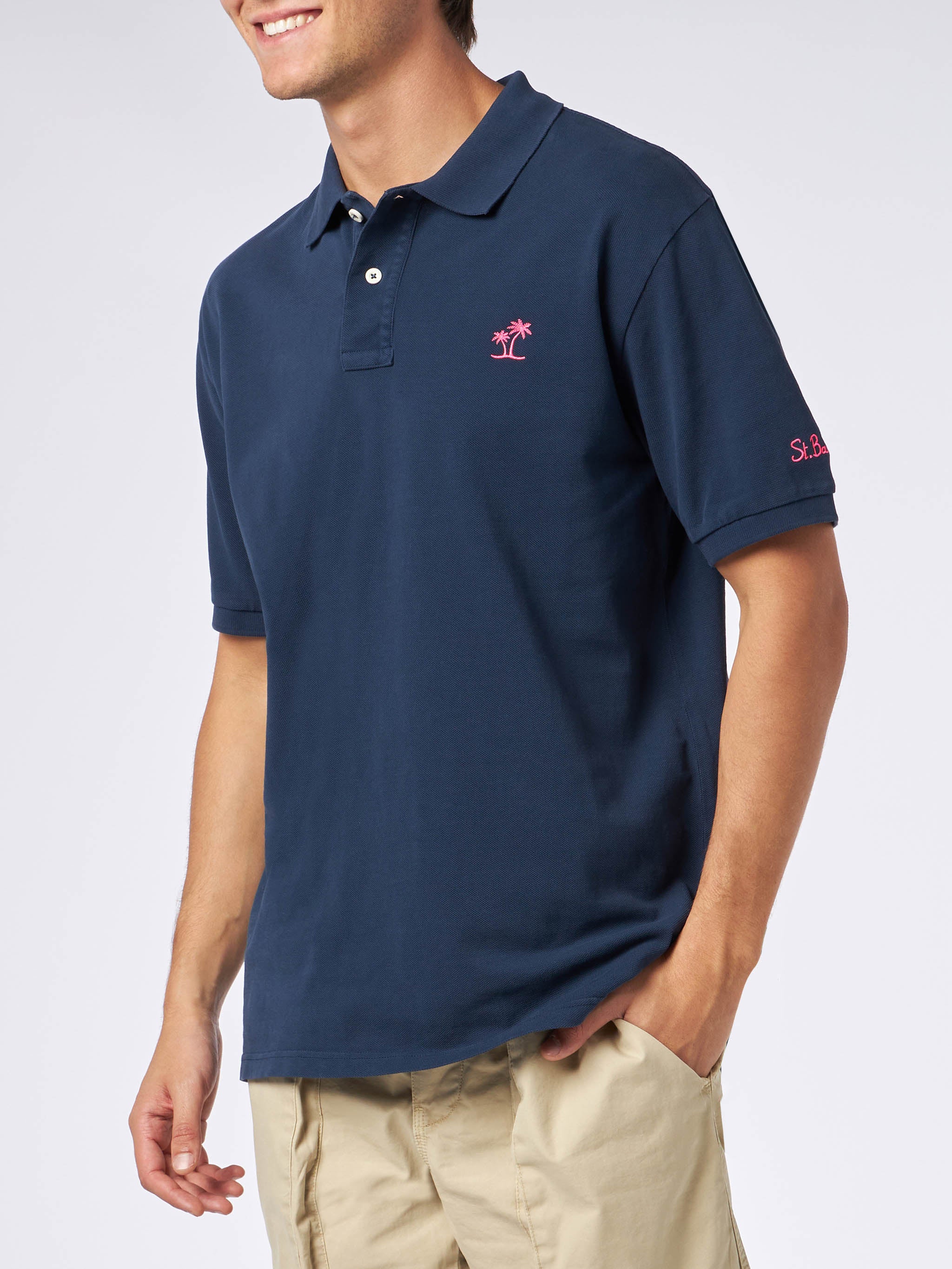 Herenpolo in blauw piqué met St. Barth-logo en vintage-effect.