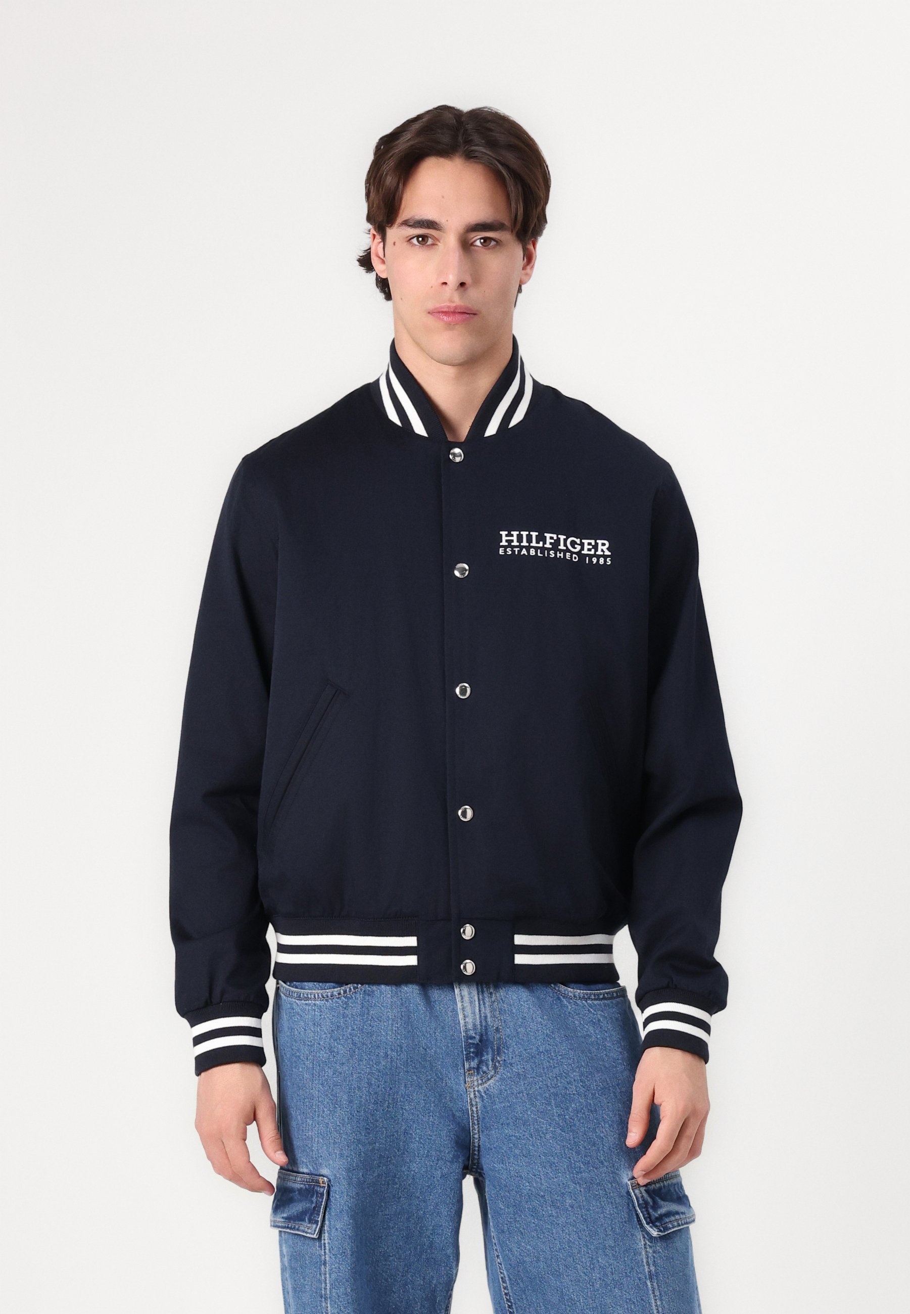Tommy Hilfiger AMERICANA VARSITY JACKET UNISEX - Bombera jaka - tuksneša debesu