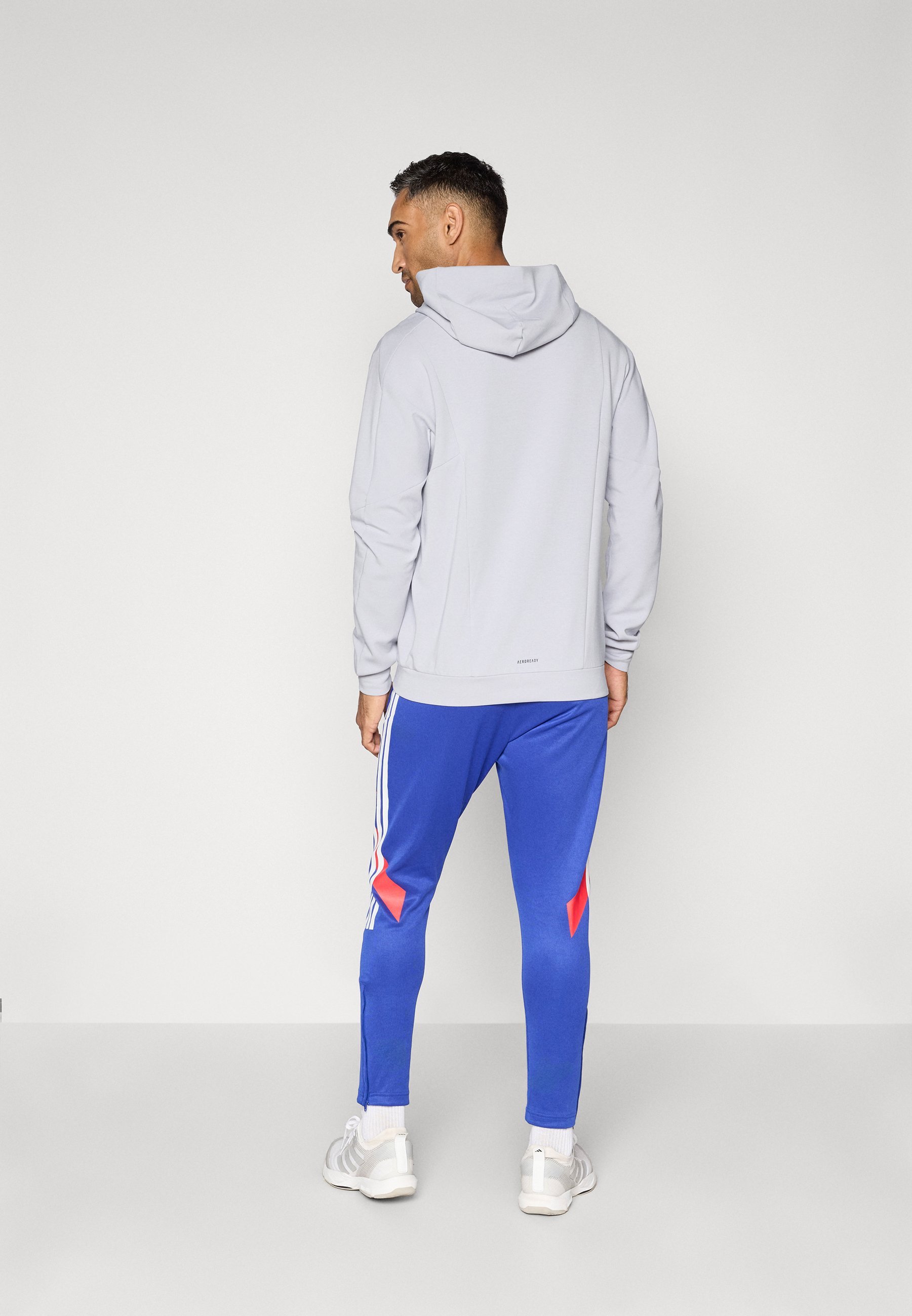 adidas Sportswear TIRO - Trainingsbroek - semi-helderblauw/zuiver robijnrood/wit