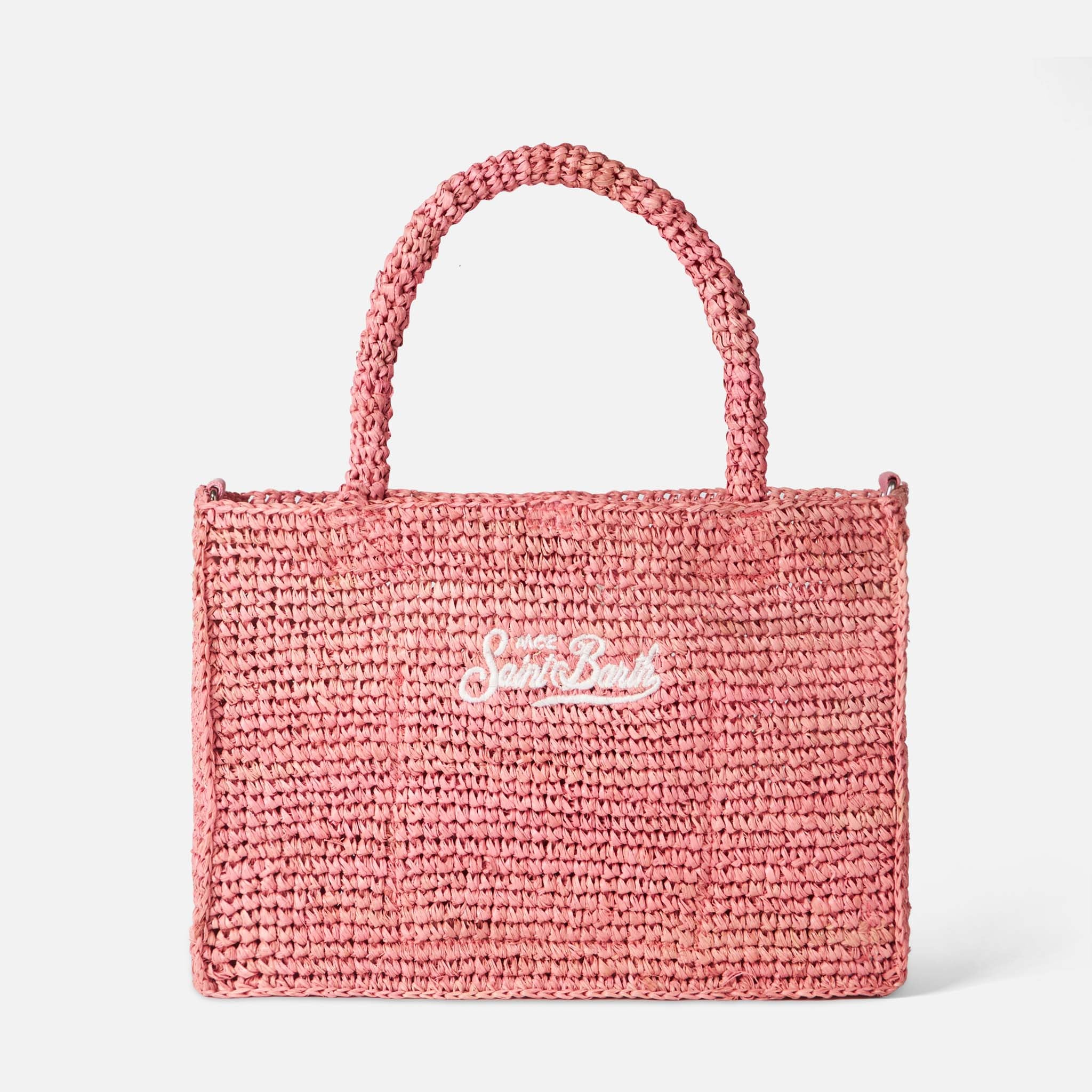 Colette-tas van roze raffia met Saint Barth-borduurwerk.