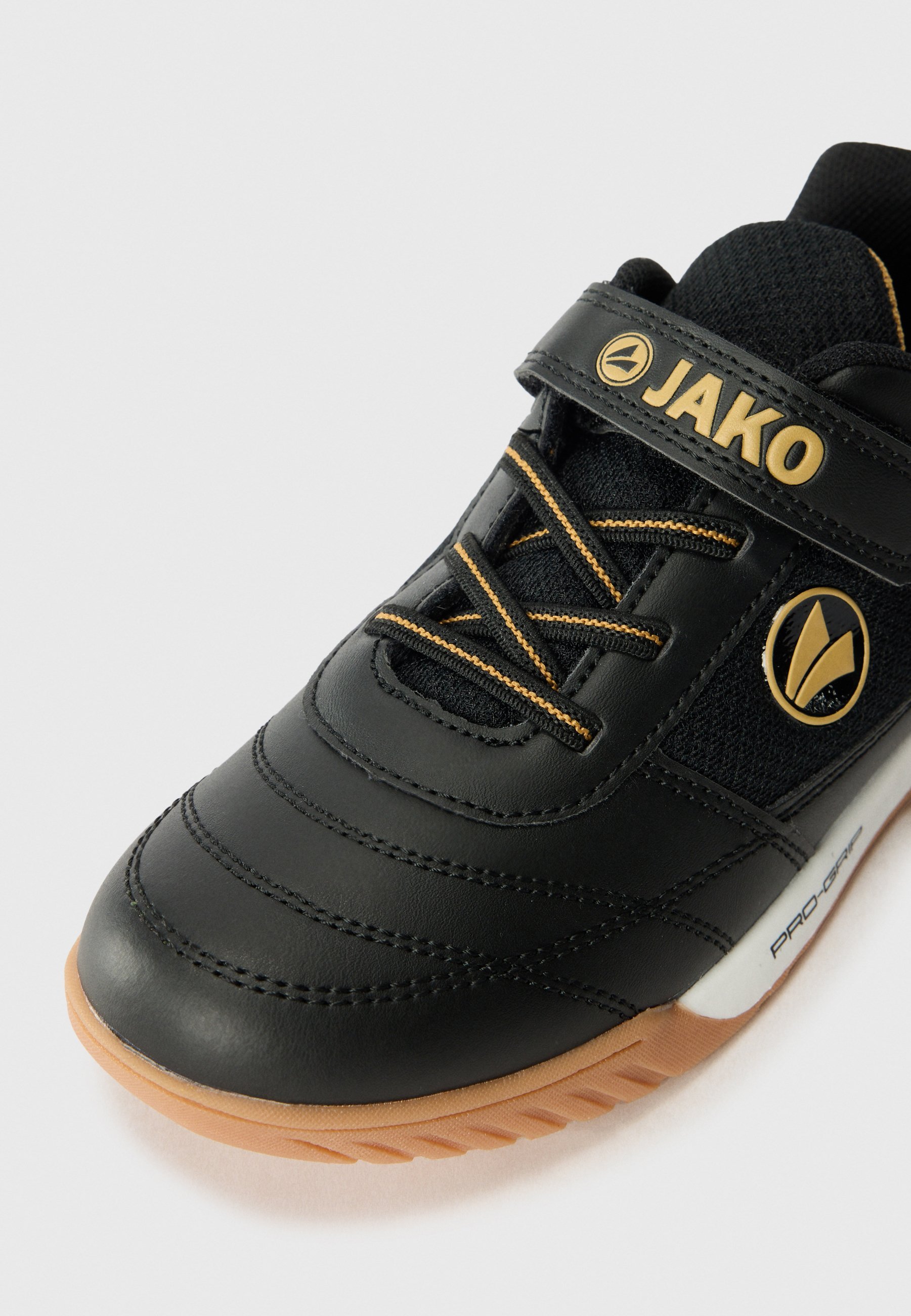 JAKO WINGER UNISEX - Chaussures de tennis multicourts - noir de jais/doré