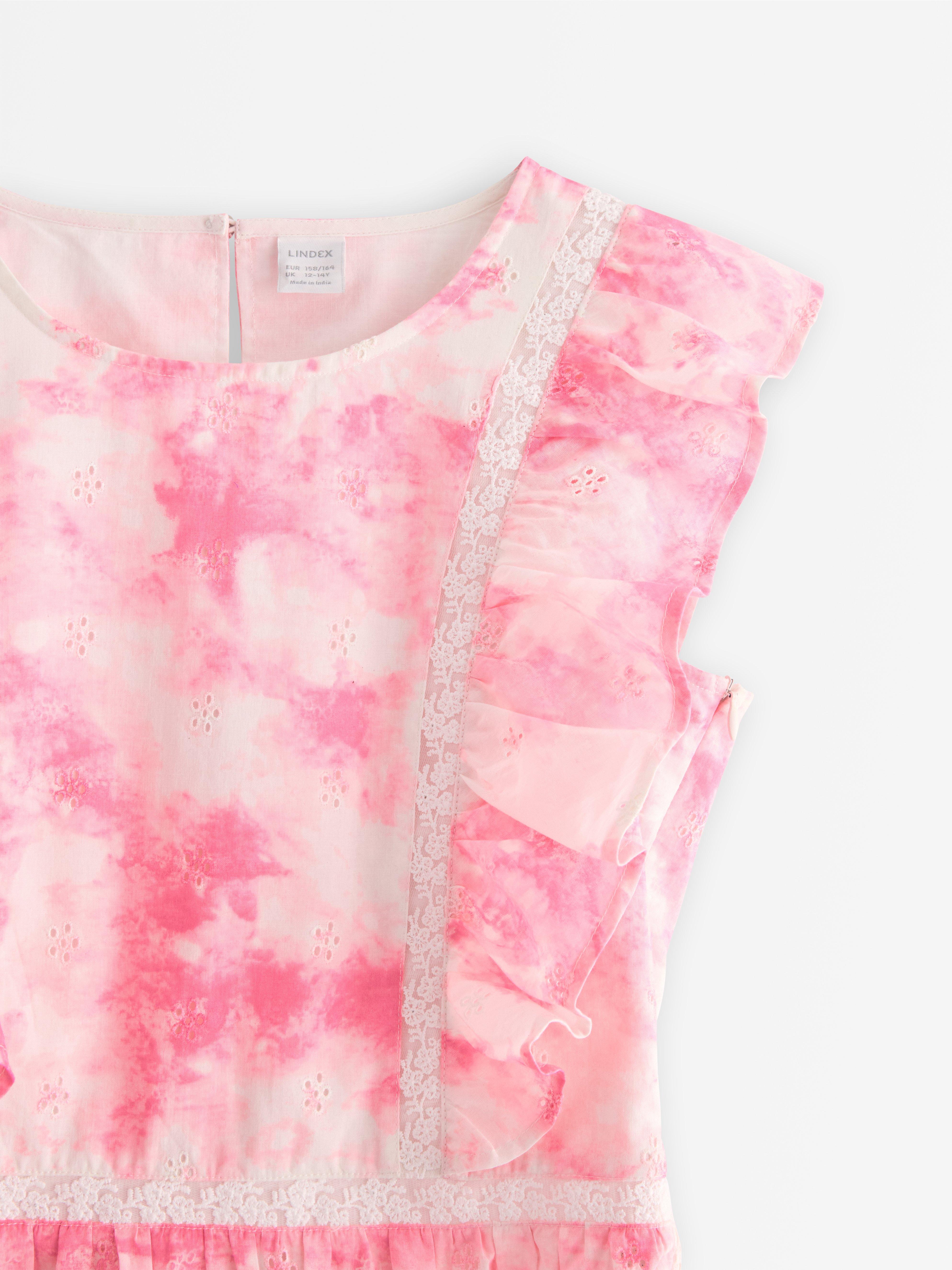 Blusa con volantes rosa claro