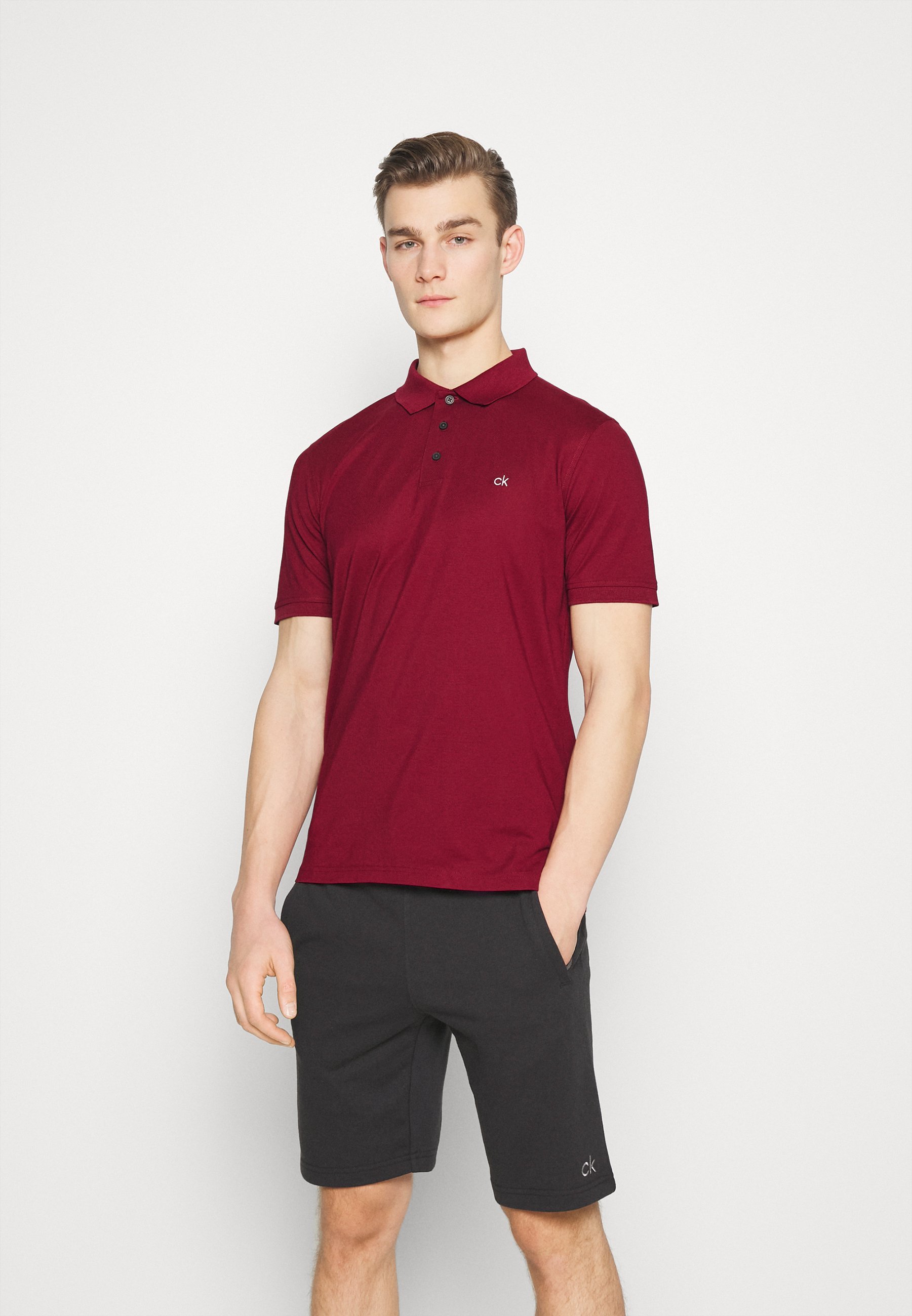Polo Calvin Klein Golf PLANET - bordeaux