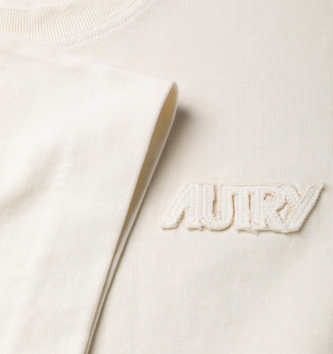 TRICOU CURPT DIN JERSEY DE BUMBAC CU CROIALĂ FLĂDUREȘTE
