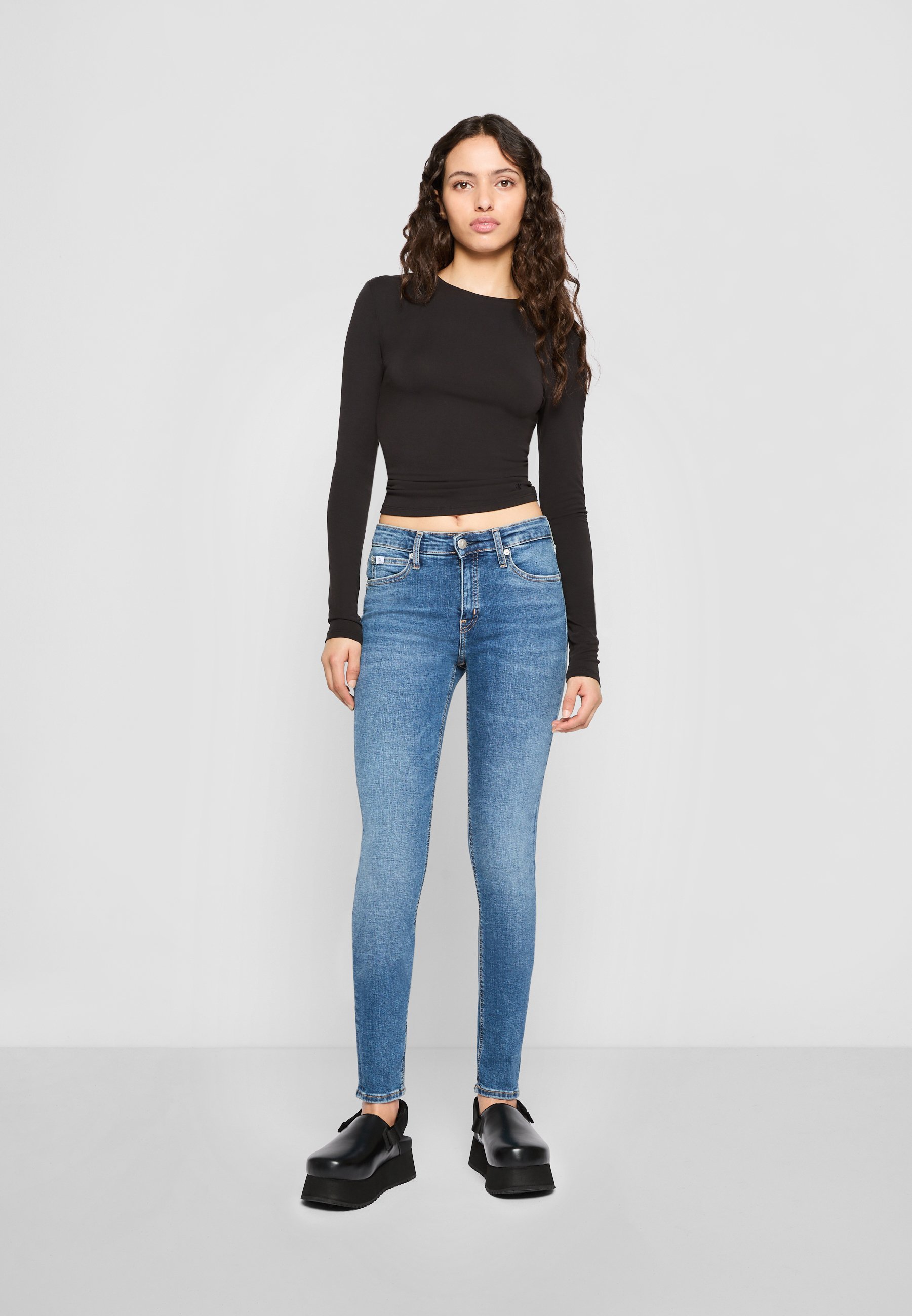 Calvin Klein Jeans MID RISE - Skinny Fit Jeans - donker denim
