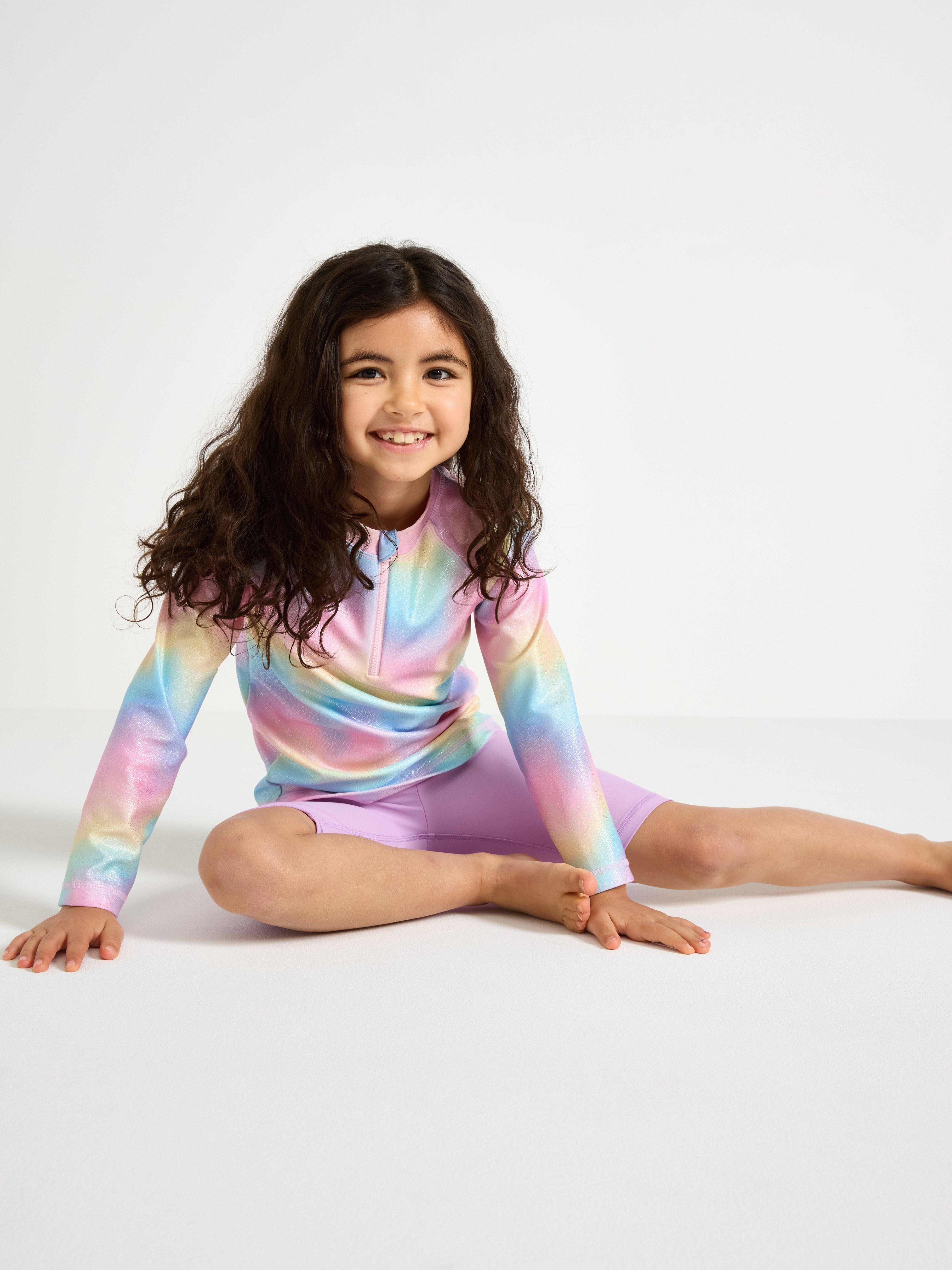 Haut scintillant avec protection UV Rose clair