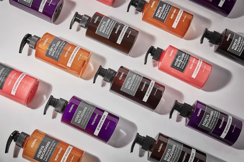 Shampoo natural KUNDAL com mel e flor de cerejeira macadâmia para cabelos secos e danificados.