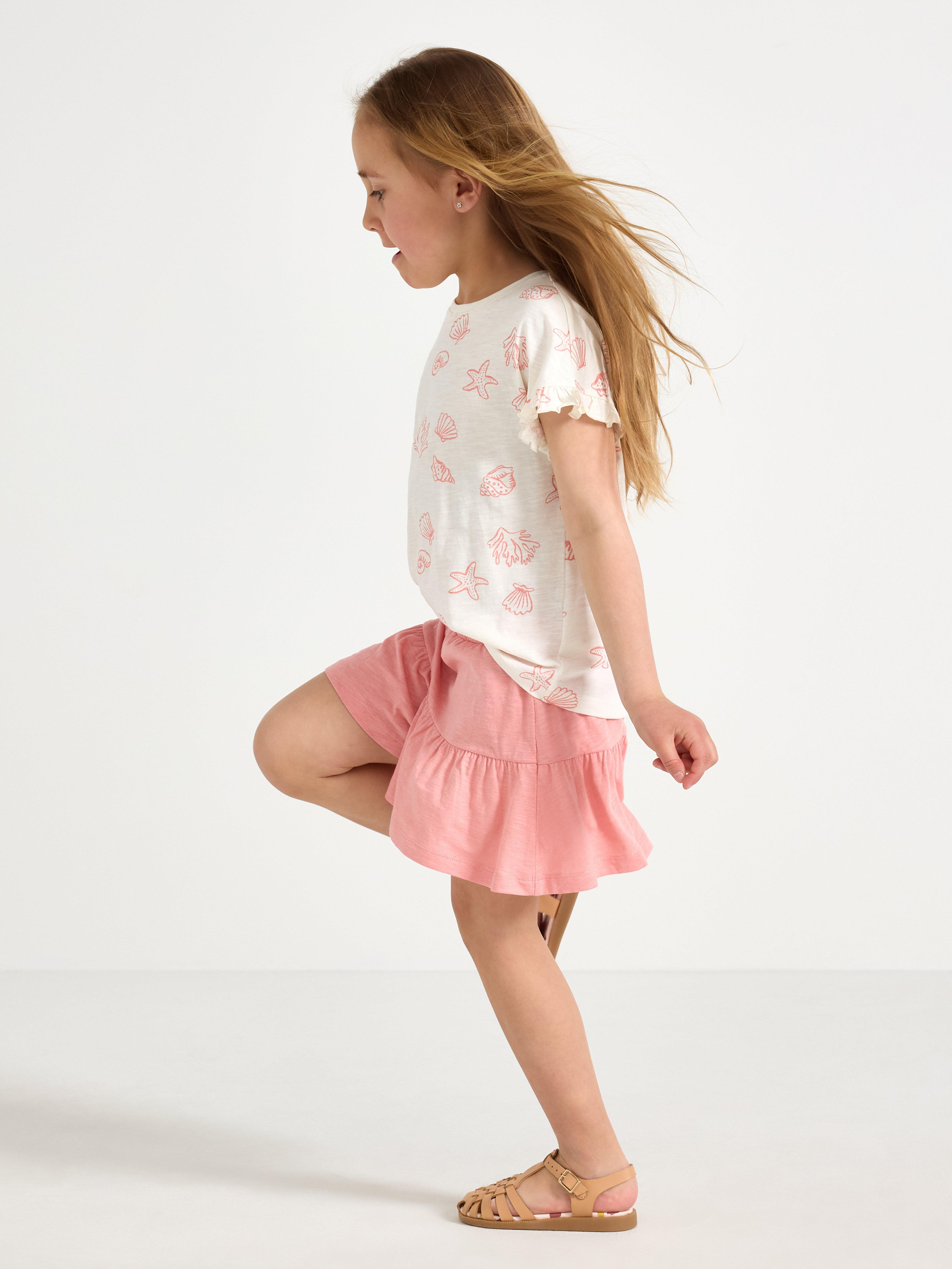 Falda culotte con volantes rosa