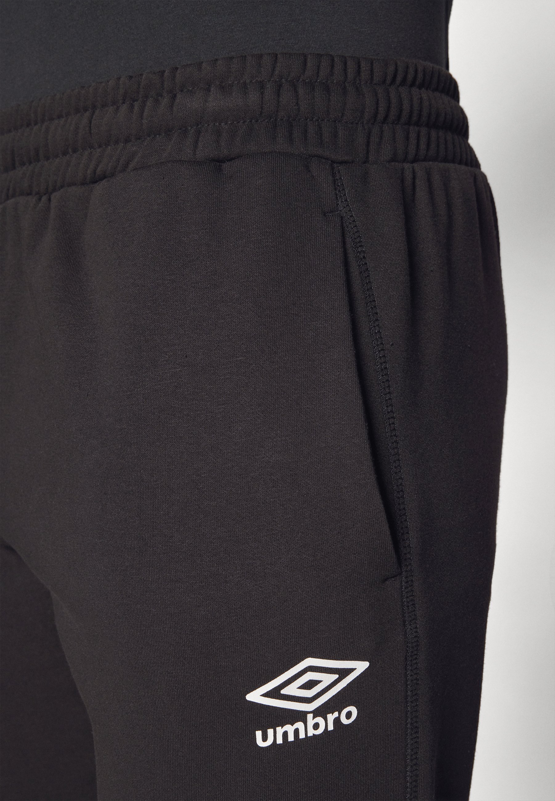 Pantaloni da jogging Umbro TEAM SKINNY - Pantaloni della tuta - nero/bianco