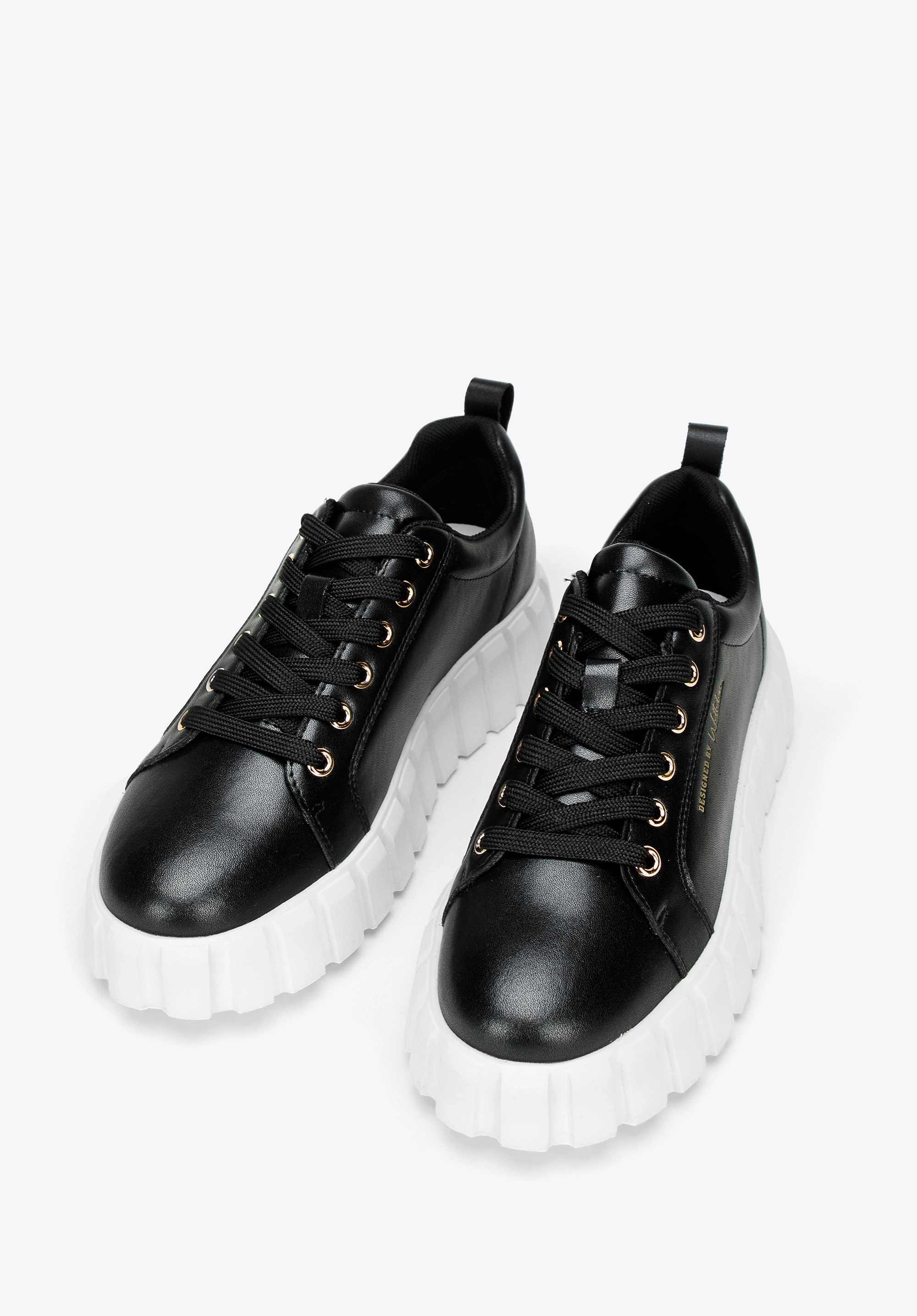 Damskie sneakersy skórzane na grubej platformie czarne