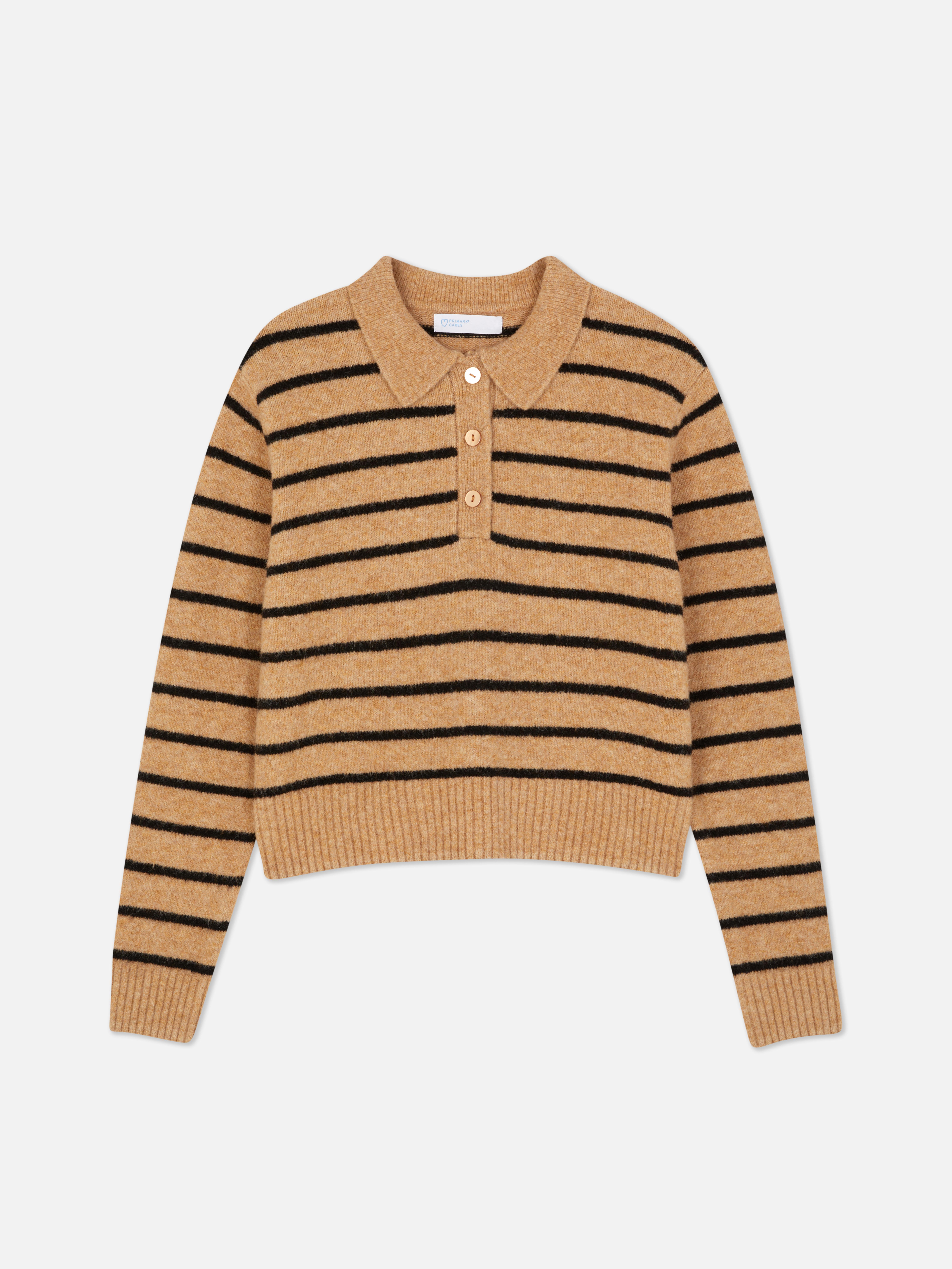 Neulepusero poolokauluksella Pehmeä neulepusero poolokauluksella ja nappilistalla mukavaan preppy-lookiin.