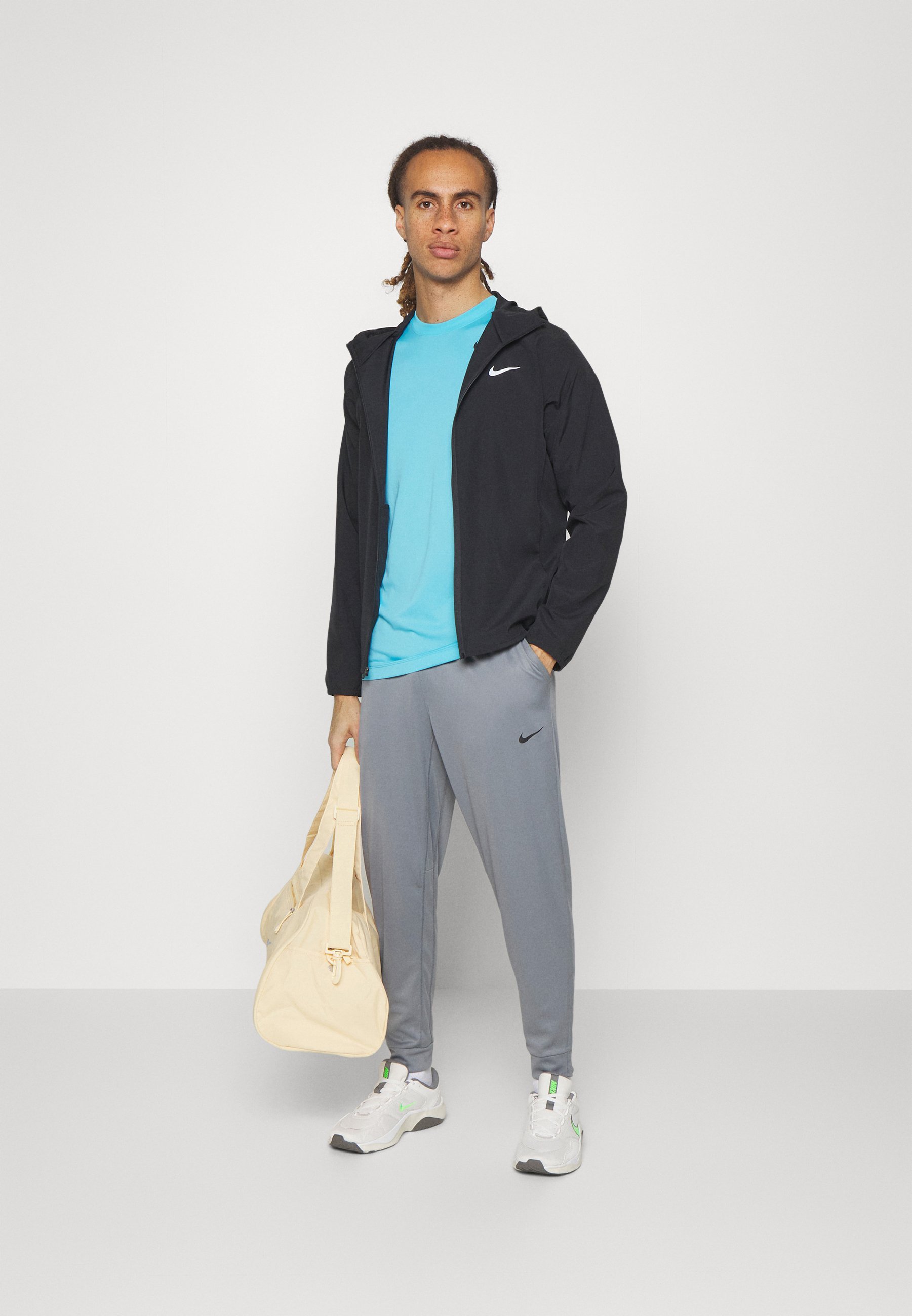 Pantaloni da tuta Nike Performance TOTALITY - grigio fumo/nero