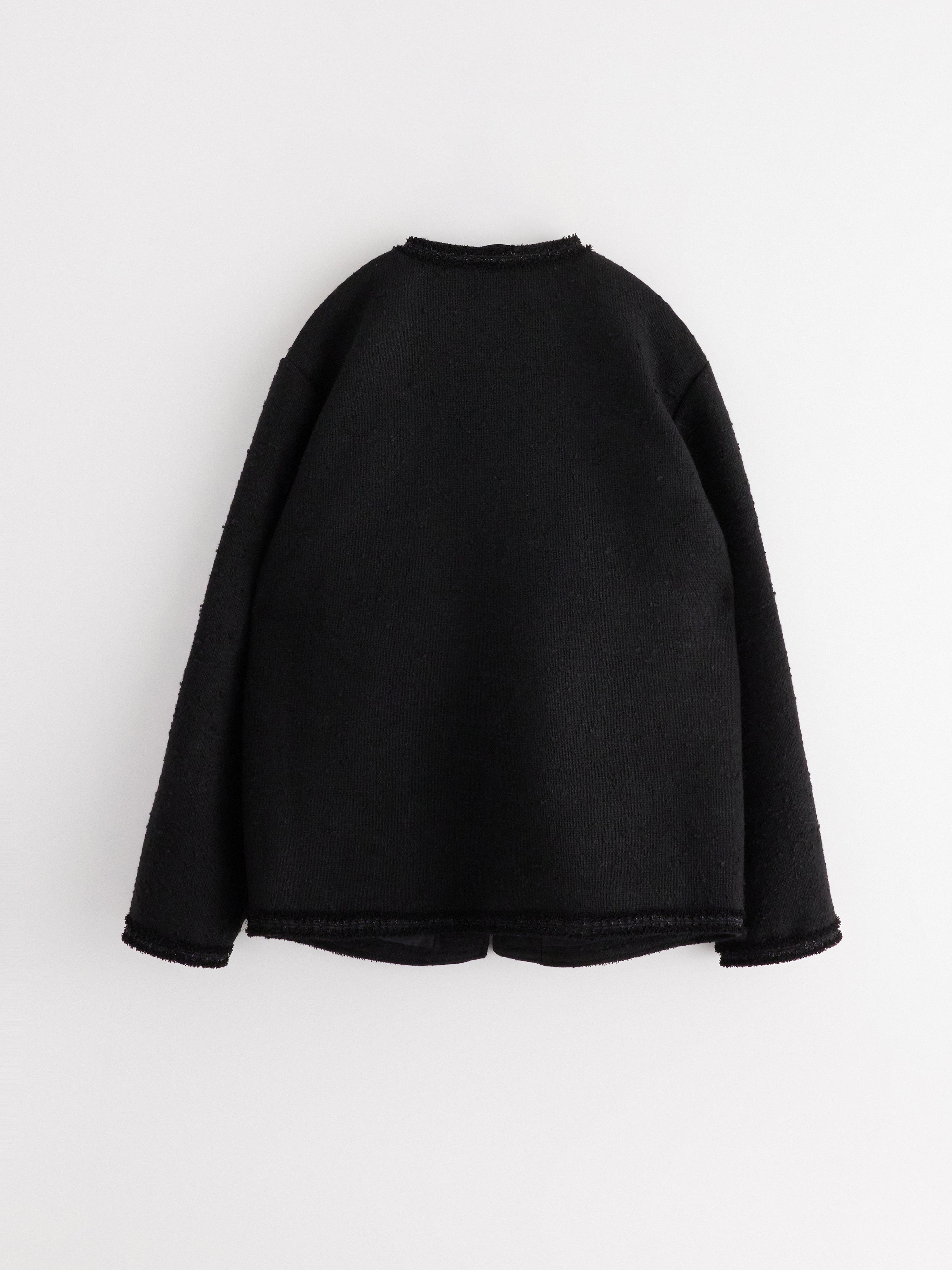 Jaqueta com detalhes em lurex preto