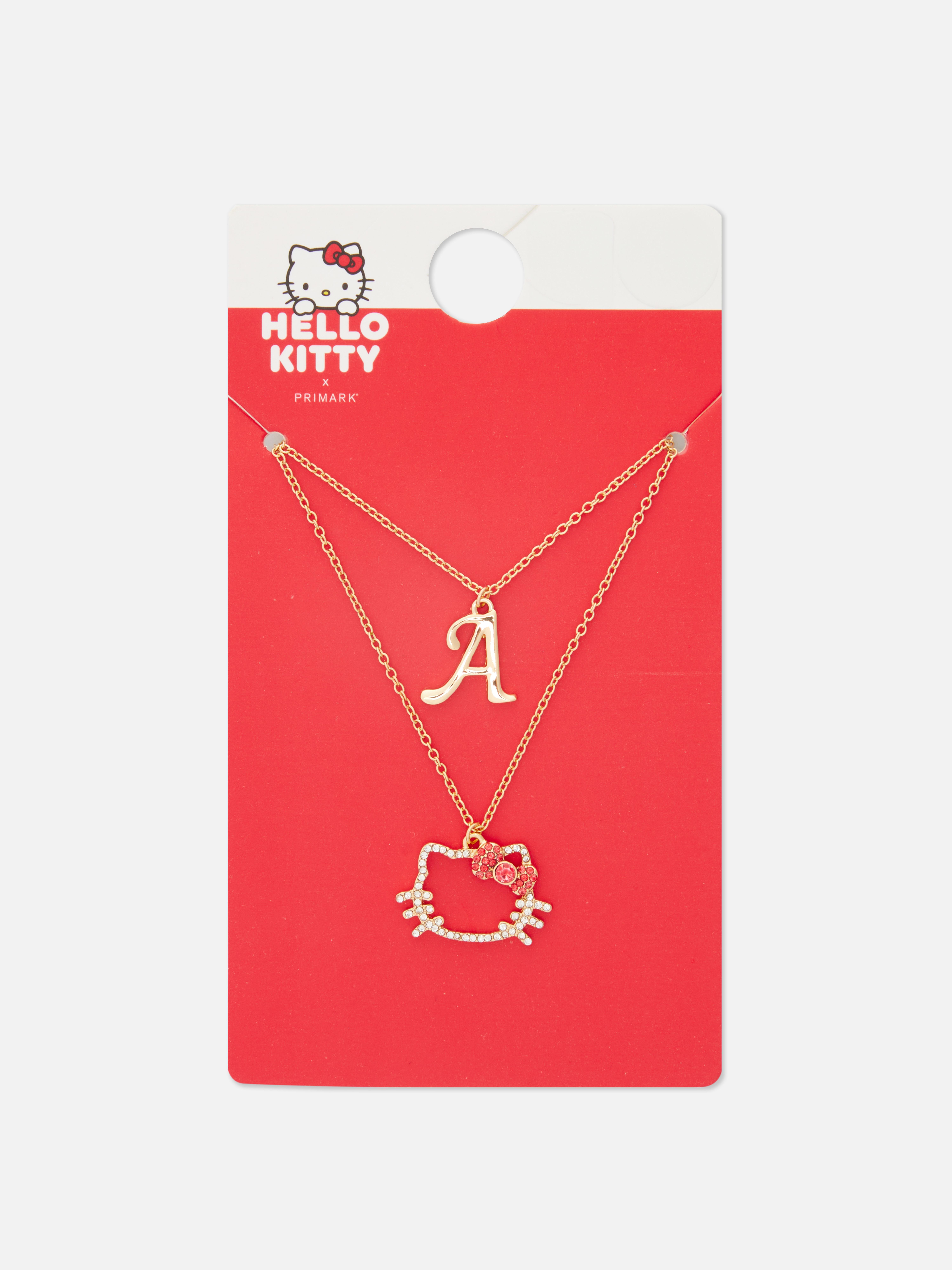 Colier dublu cu inițiala Hello Kitty. Un colier drăguț cu mai multe inițiale și pandantive Hello Kitty.
