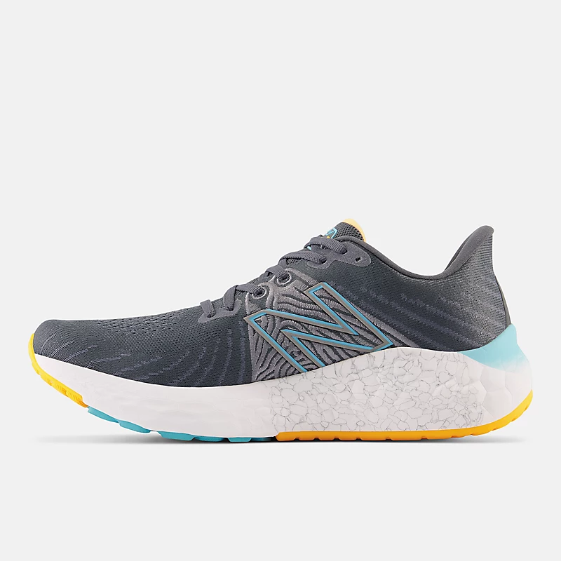 Fresh Foam X Vongo v5 herenschoenen – Grafiet met Summer Aqua en Hot Marigold.