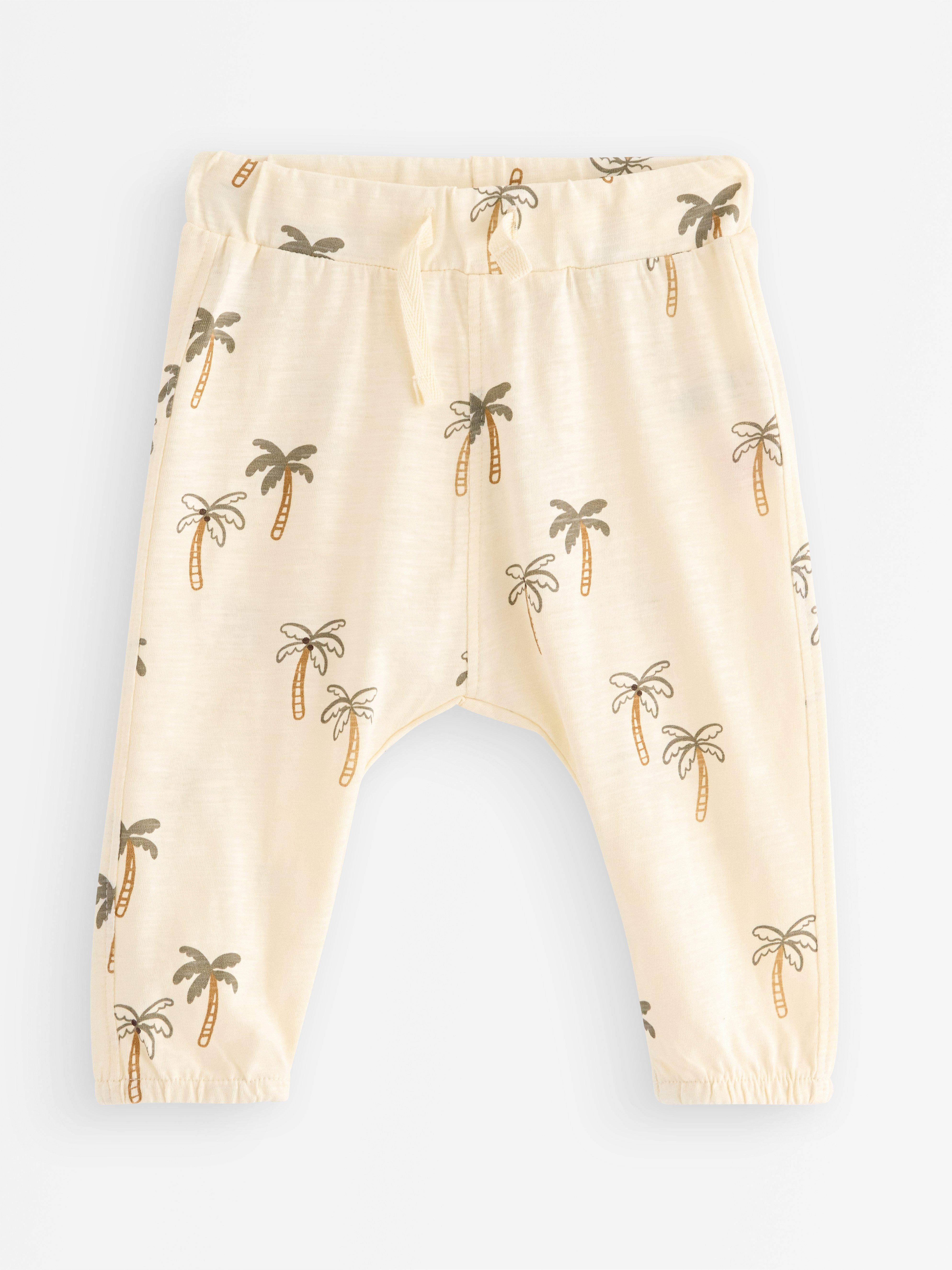 Pantalones deportivos de punto flameado blancos