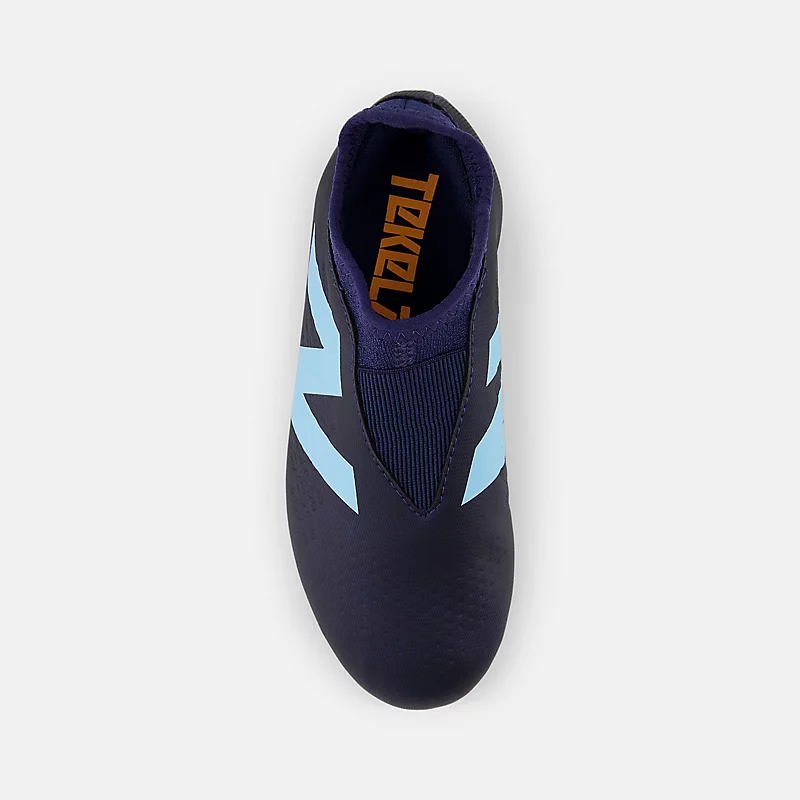 Ghete de fotbal TEKELA MAGIQUE JNR FG V4+ pentru copii - bleumarin cu albastru deschis și mango aprins