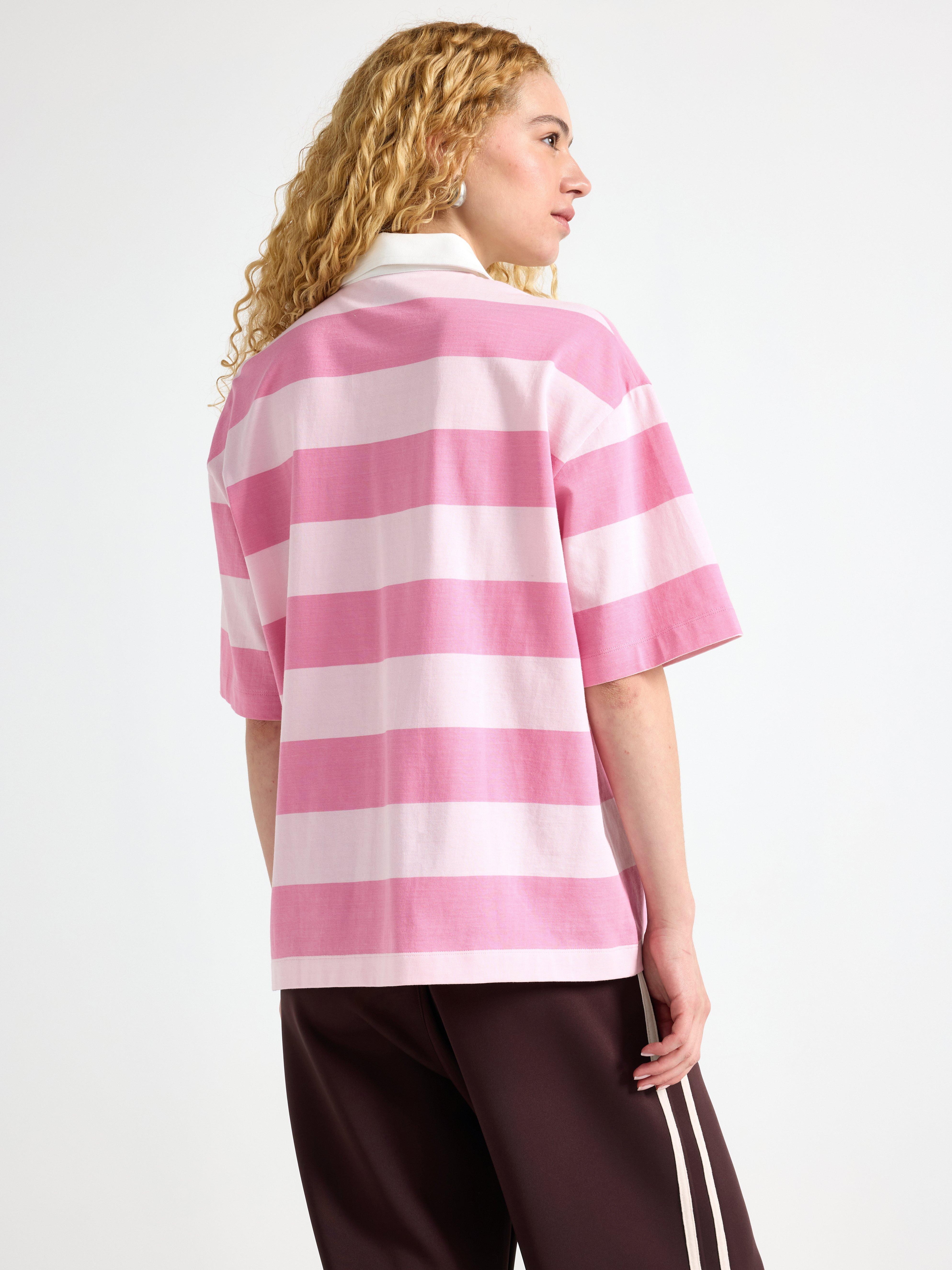 Camiseta de rugby de manga corta, color rosa claro.