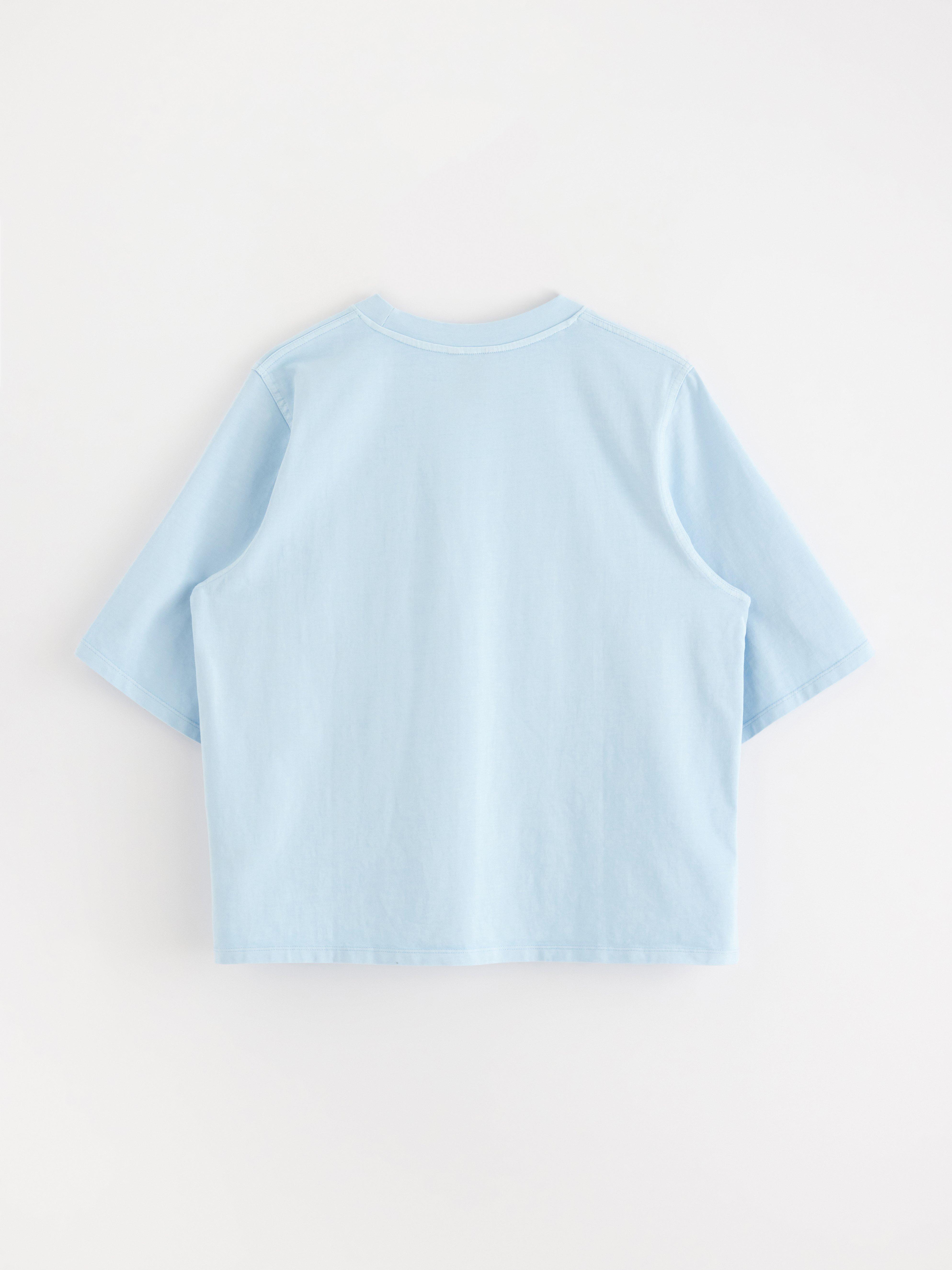 Camiseta oversized azul claro
