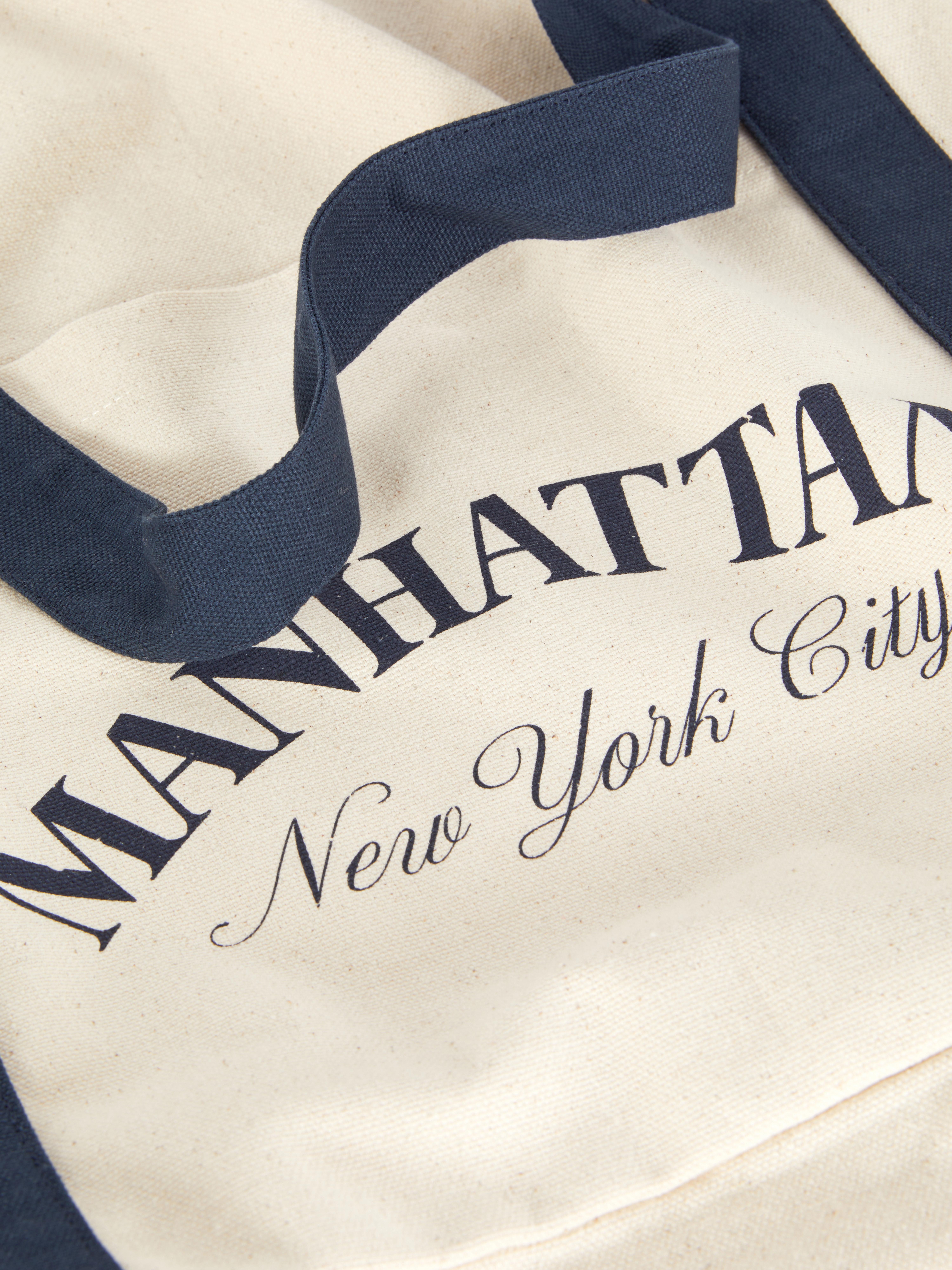Geantă tote Manhattan supradimensionată din pânză. Această geantă tote mare, cu mâner în partea de sus, este pentru toți fanii Manhattan.