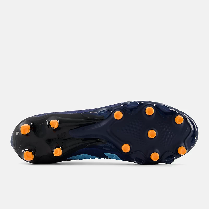 Zapatillas unisex TEKELA PRO FG V4+ - NB Navy z Team Sky Blue i Hot Mango