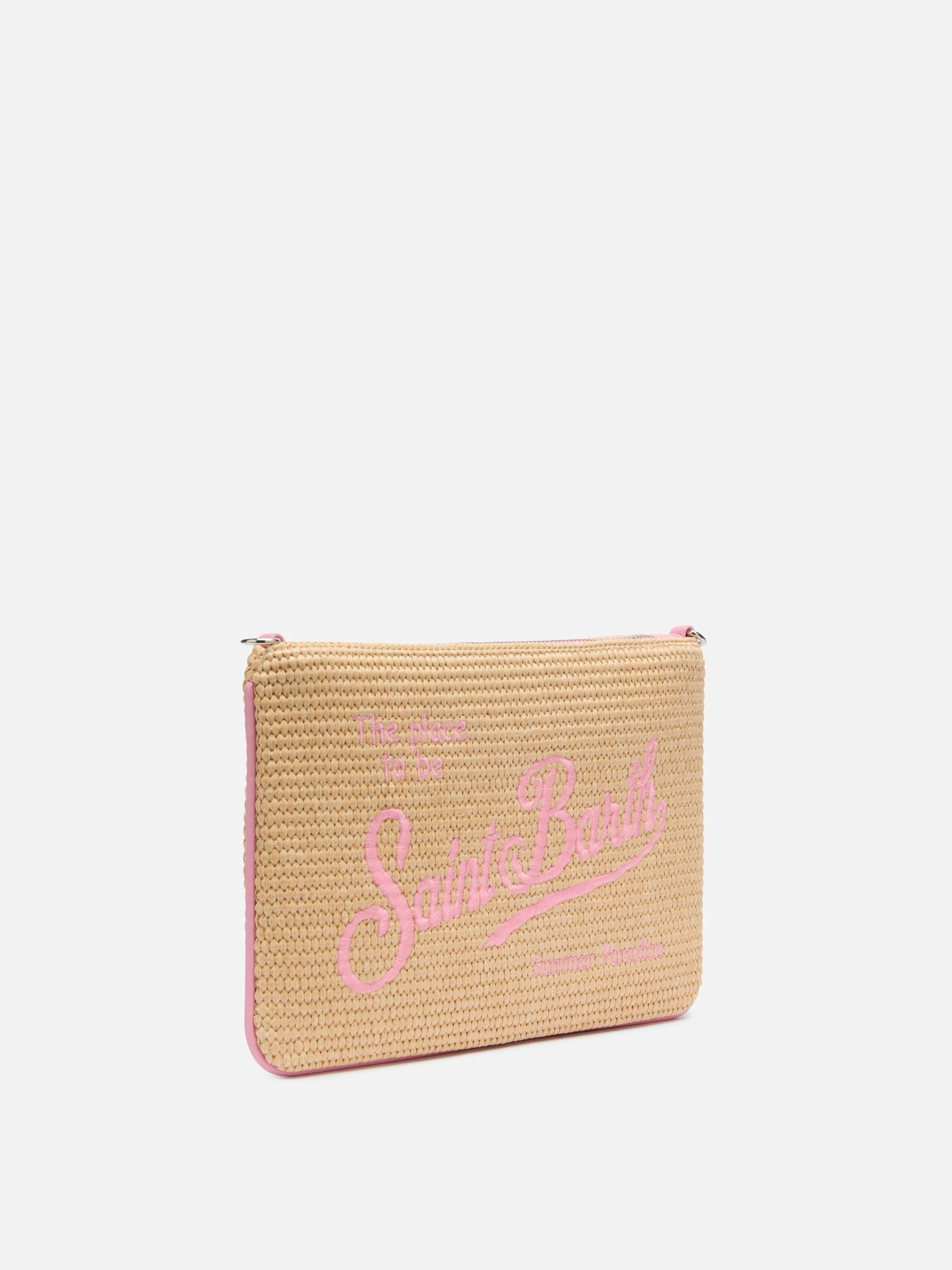 Parijse clutch met stro-effect en roze details.