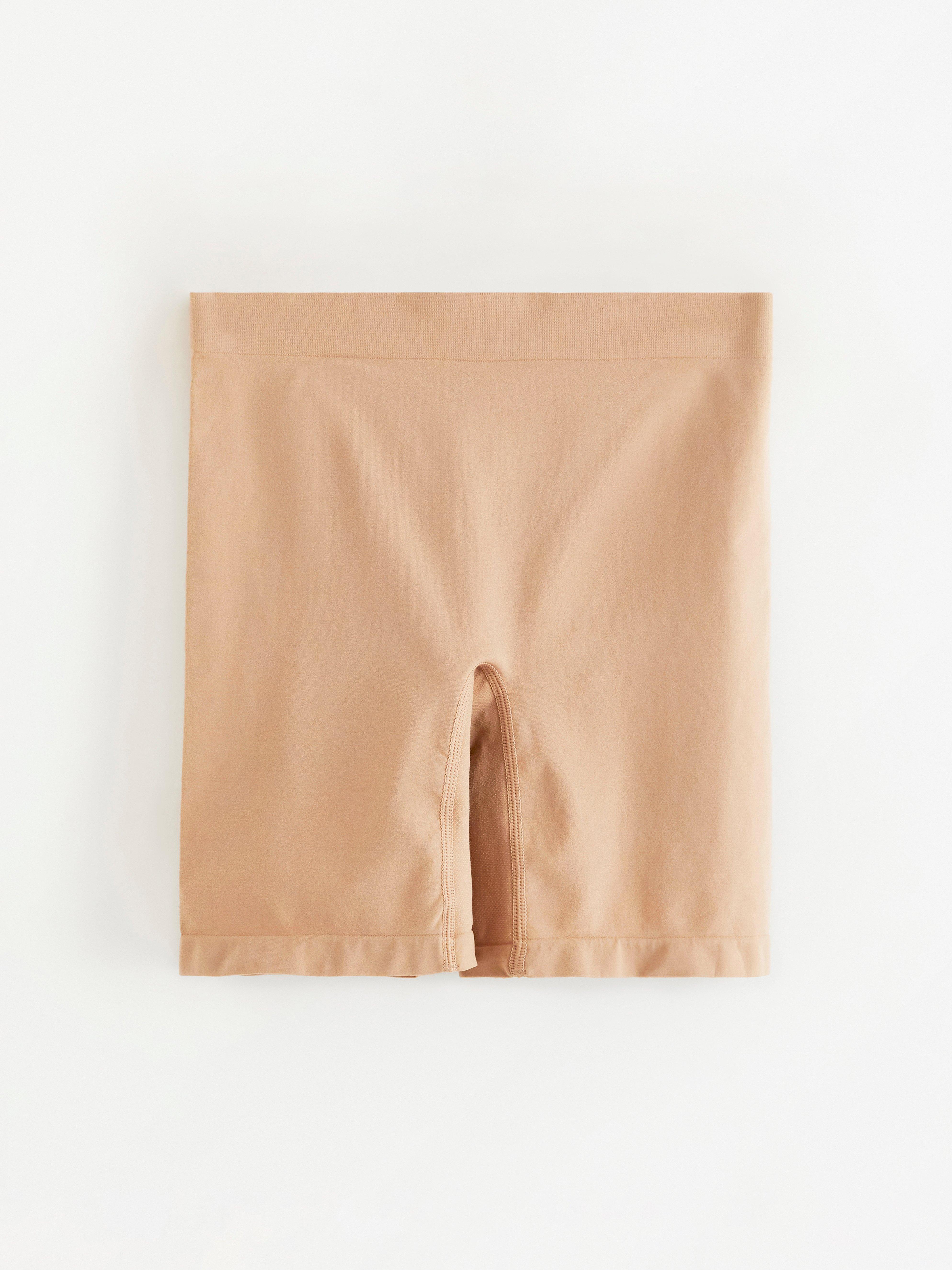 Pantalones cortos de ciclista de talle alto sin costuras, color beige.