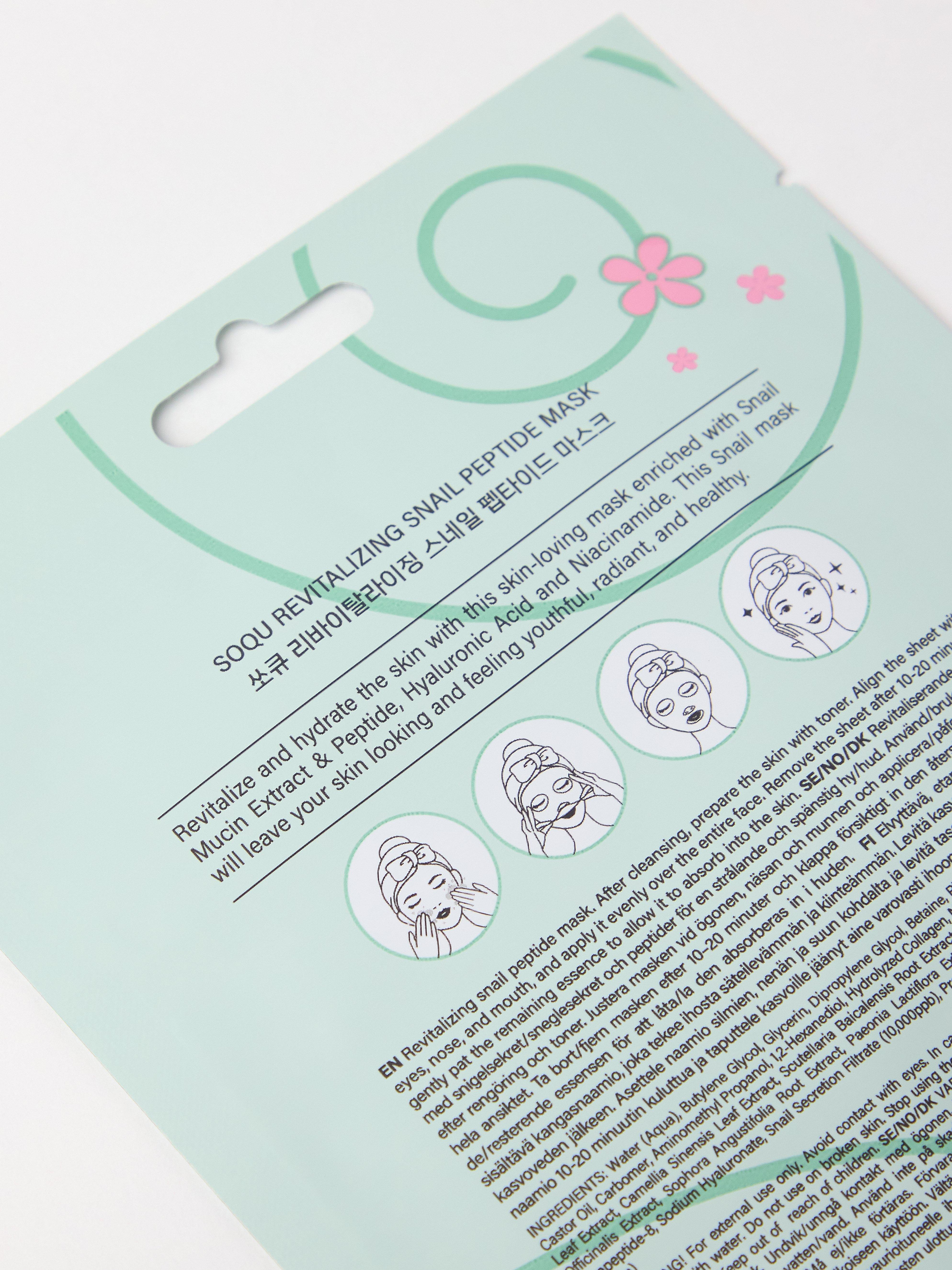 Máscara facial em tecido com peptídeos de caracol SOQU, sem cor.