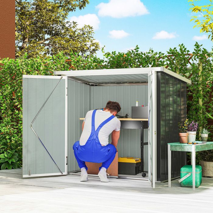 Caseta/cabaña de jardín - Outsunny - 1,09 m² para almacenamiento de herramientas, 2 puertas con cerradura - chapa de acero - 147x86x134cm - blanco y negro
