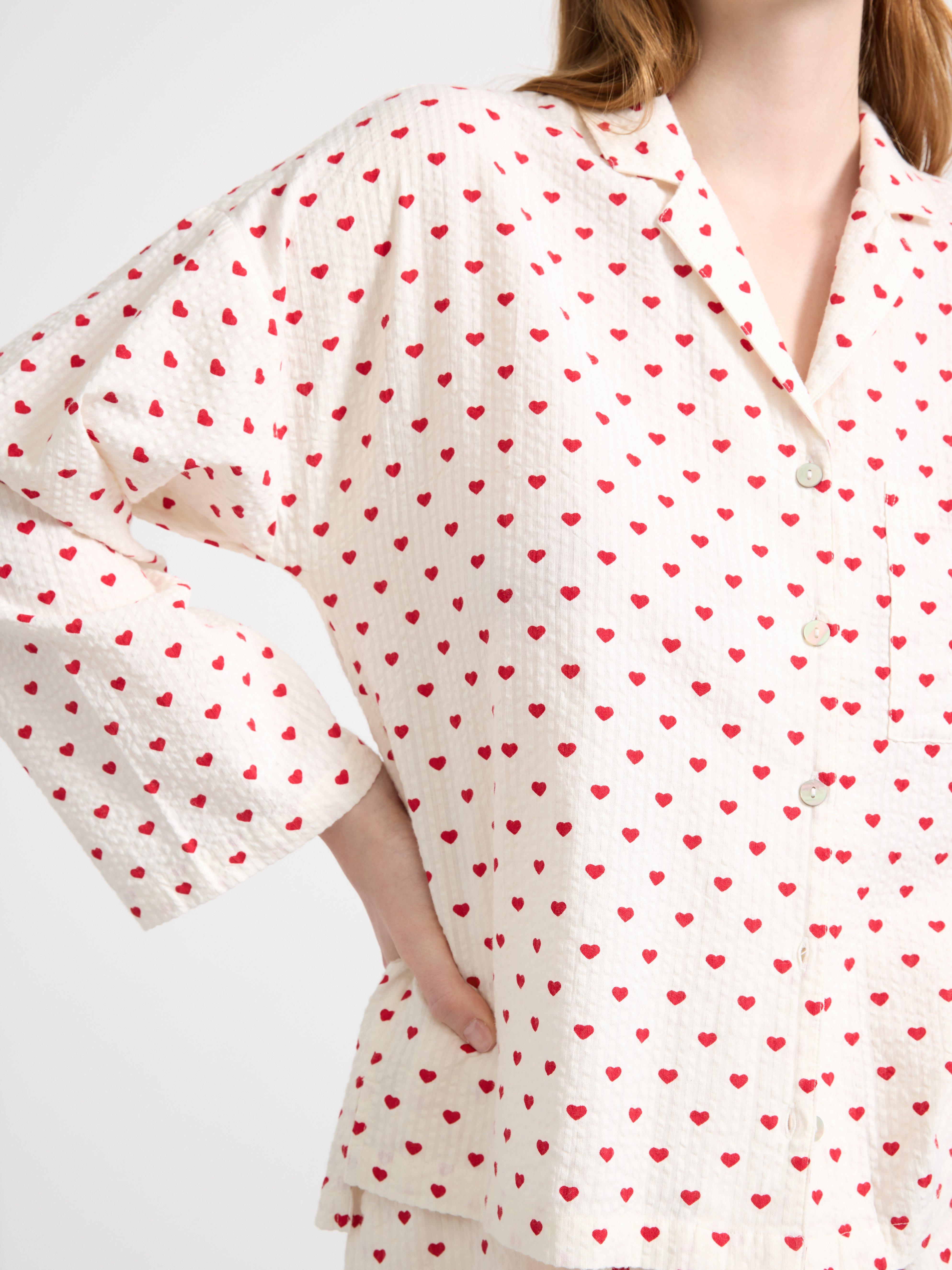 Camisola vermelha com estampa de ondas de riacho