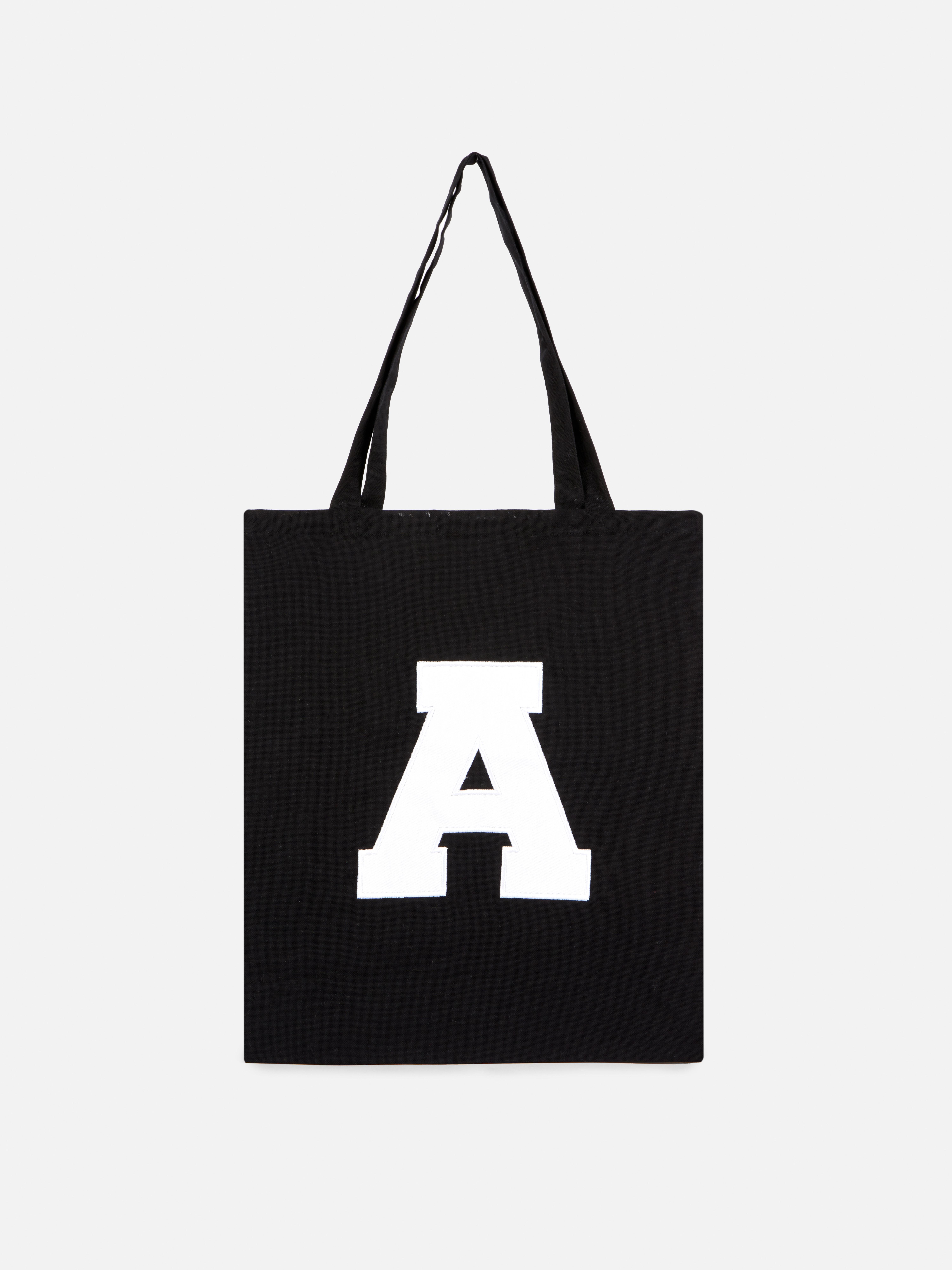 Borsa shopper in tela con iniziale L'accessorio personale per eccellenza: la nostra borsa shopper in tela con iniziale