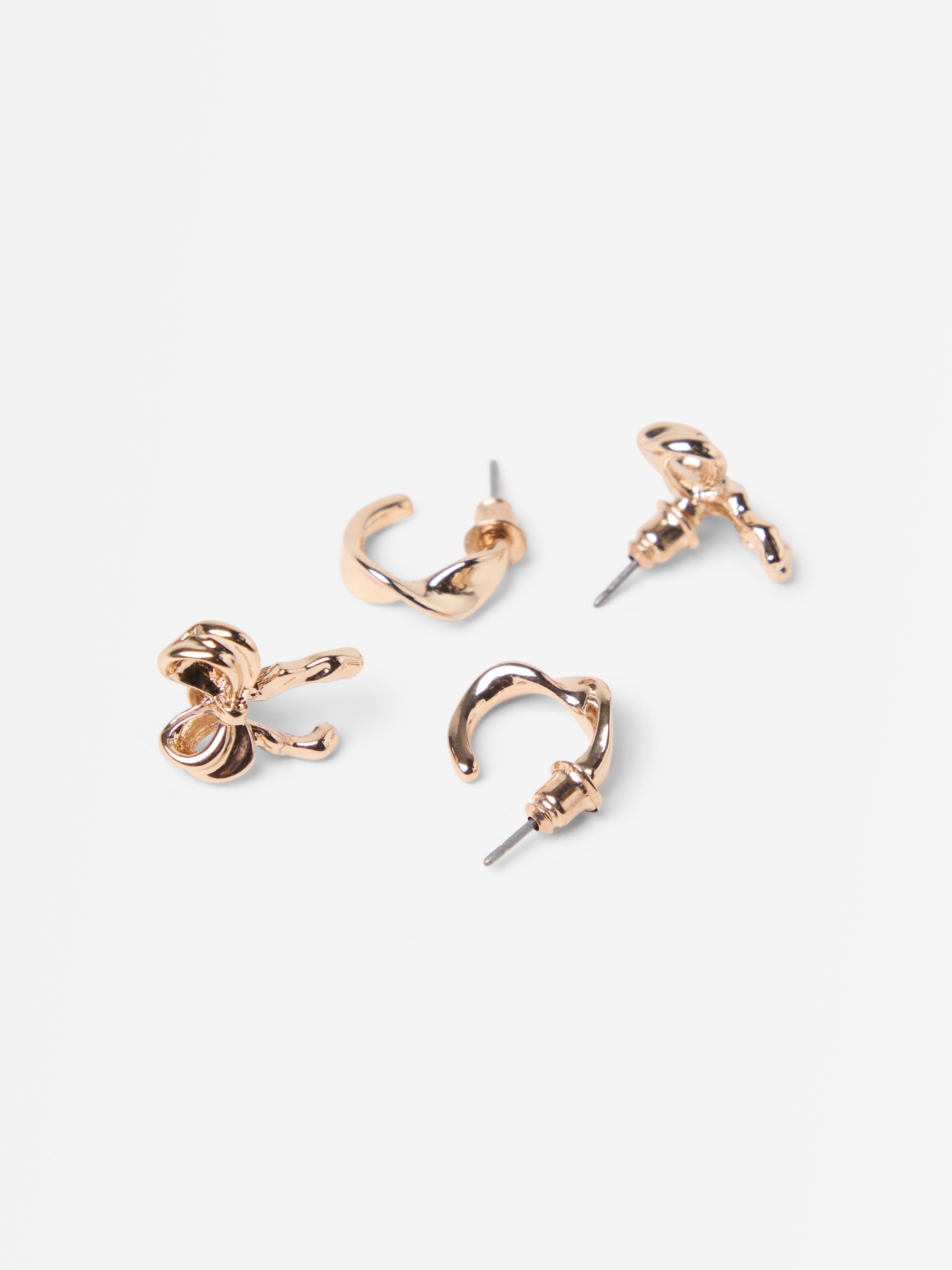 Set van 2 gouden oorbellen