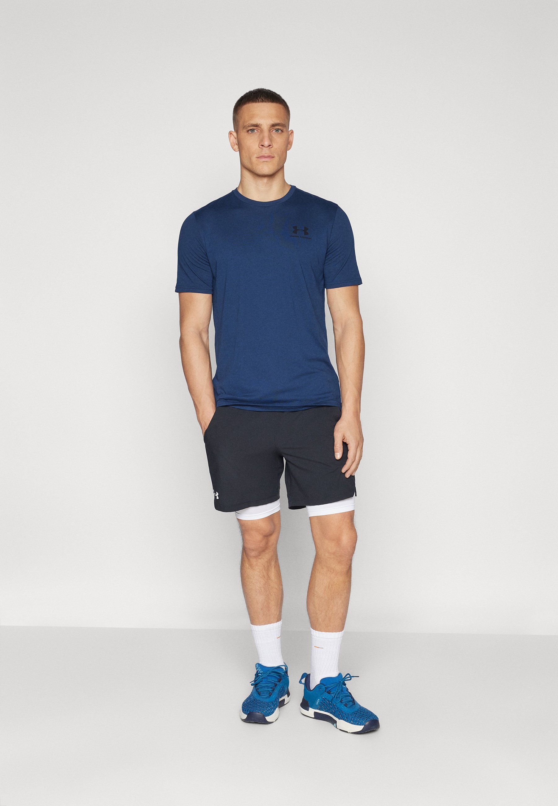 Logo Under Armour sul petto sinistro - T-shirt stampata - academy/nero