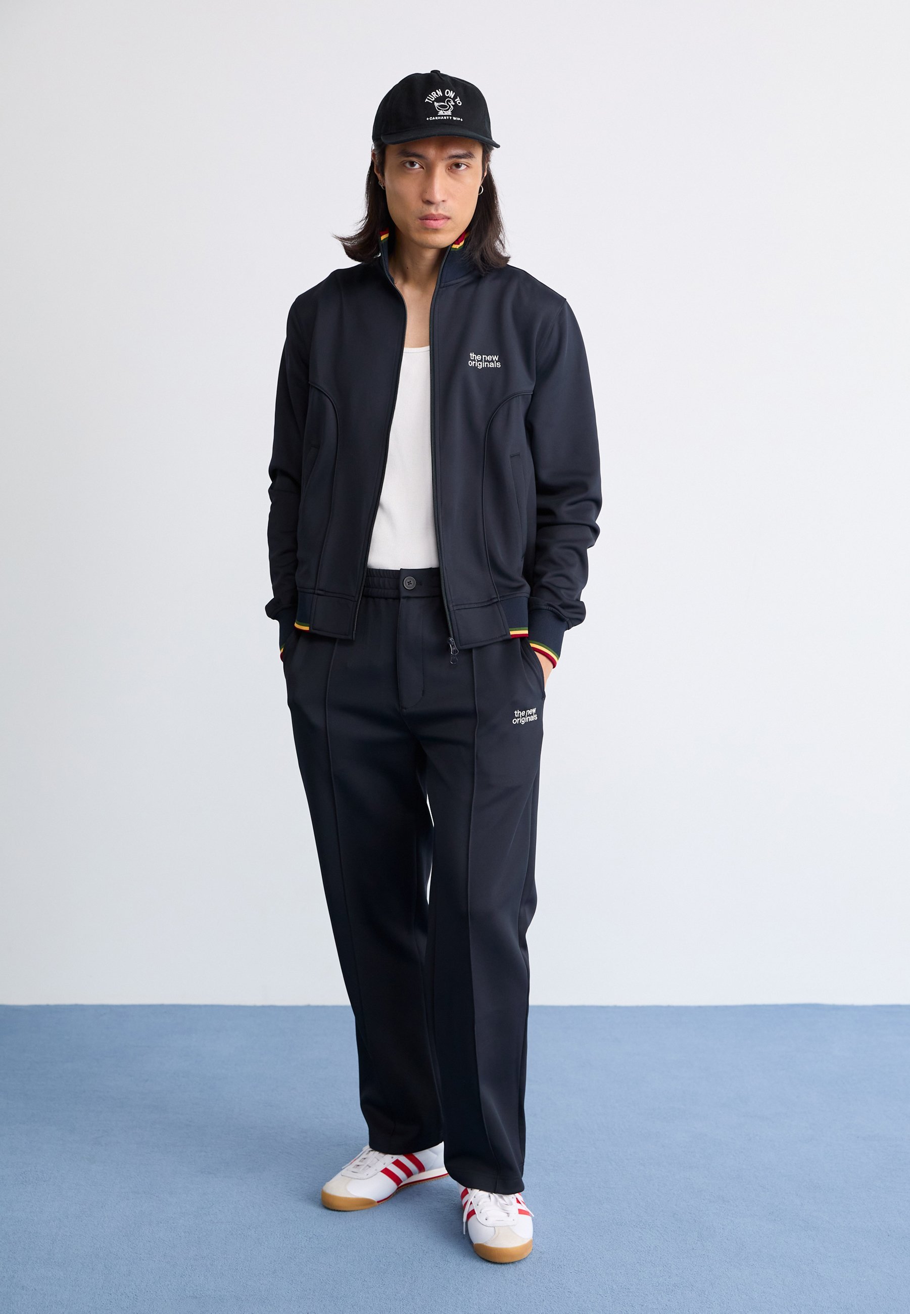 De New Originals EMBLEM TRACK JACKET - Trainingsjack - marineblauw/pan-Afrikaans