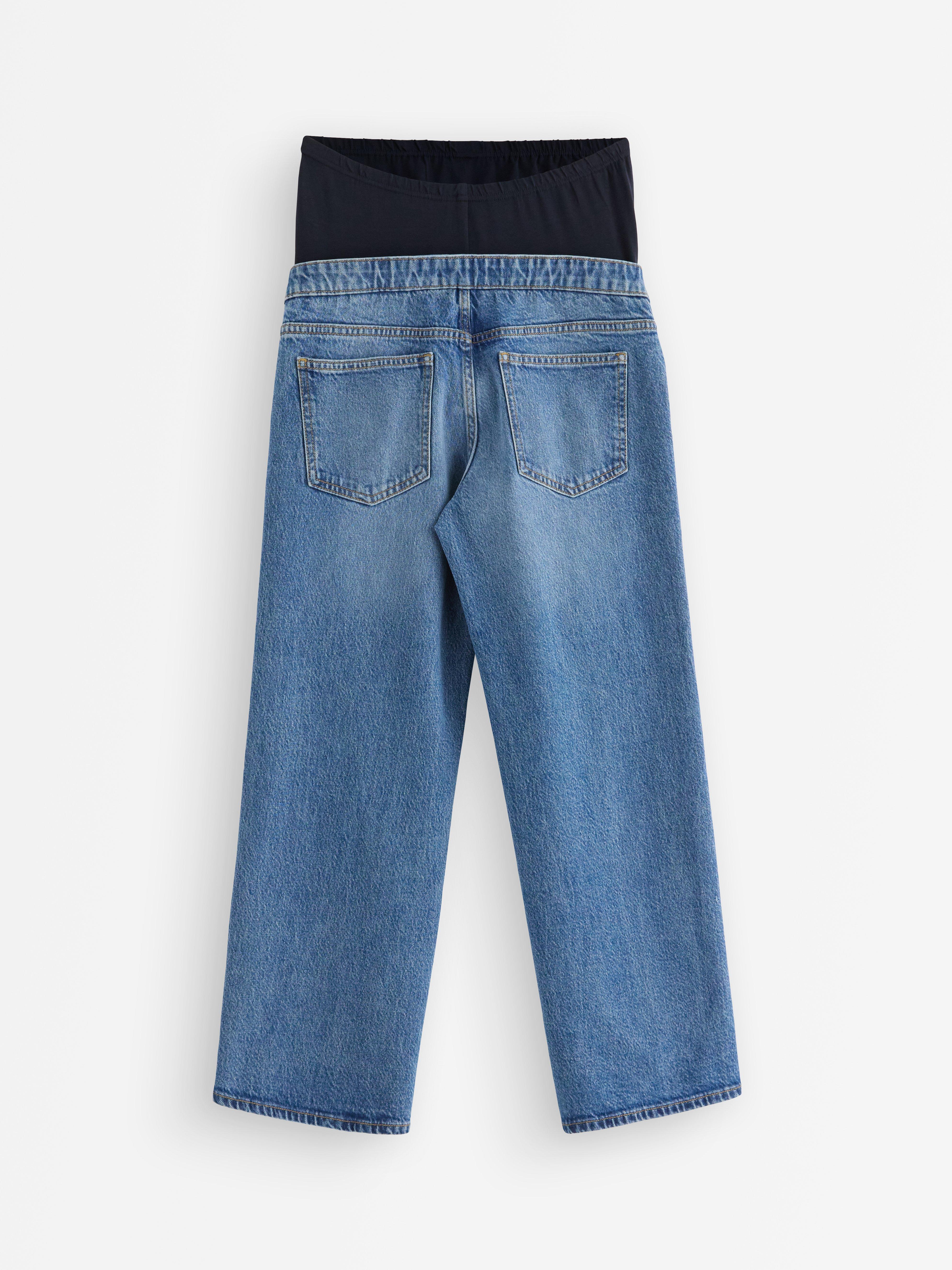 Calça jeans cropped MOM WIDE Hanna para gestantes, em denim claro.
