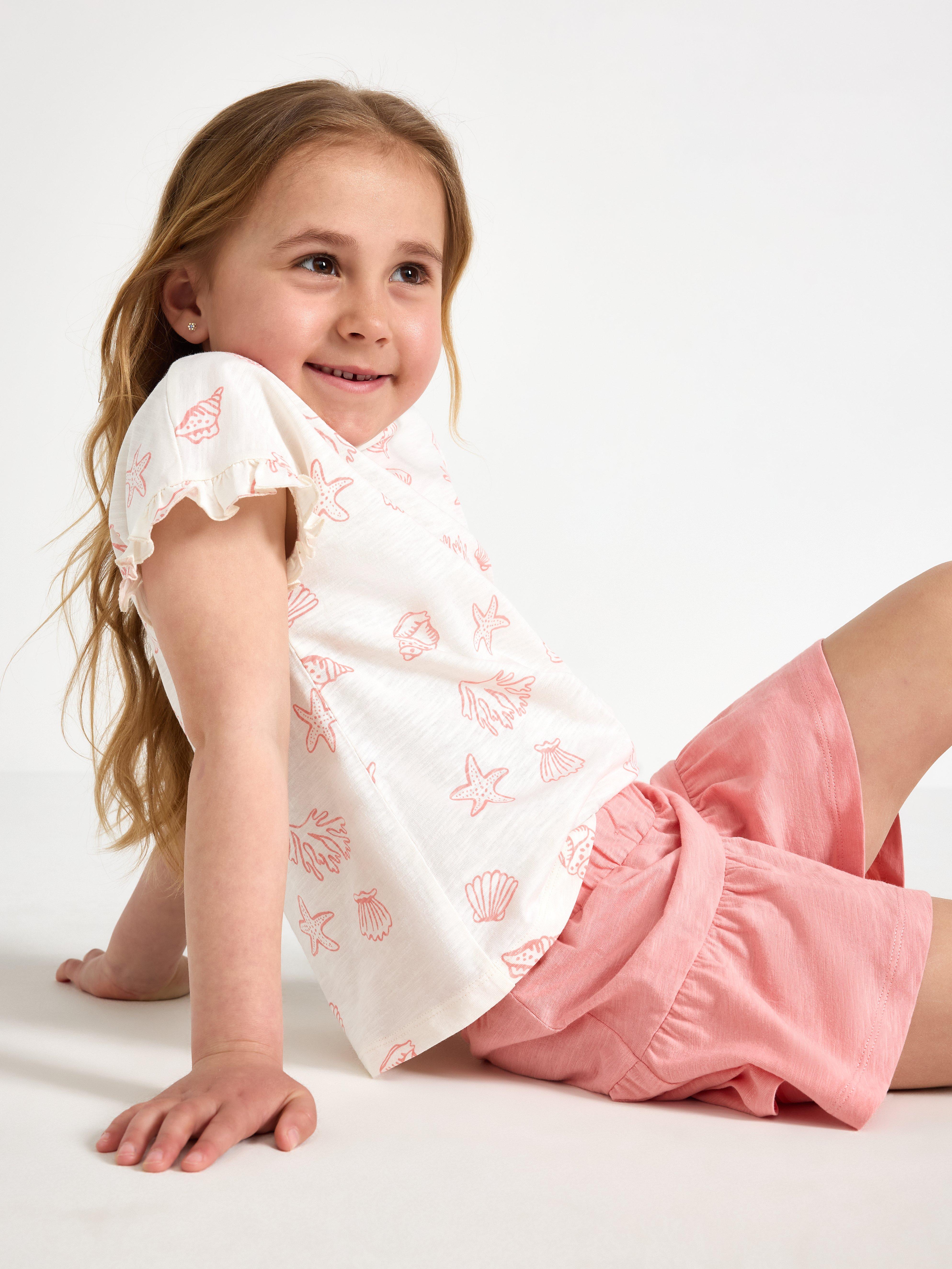 Falda culotte con volantes rosa