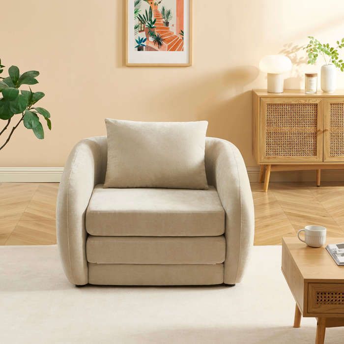 Sillón PAZ con relleno de espuma desplegada en tejido de chenilla beige.