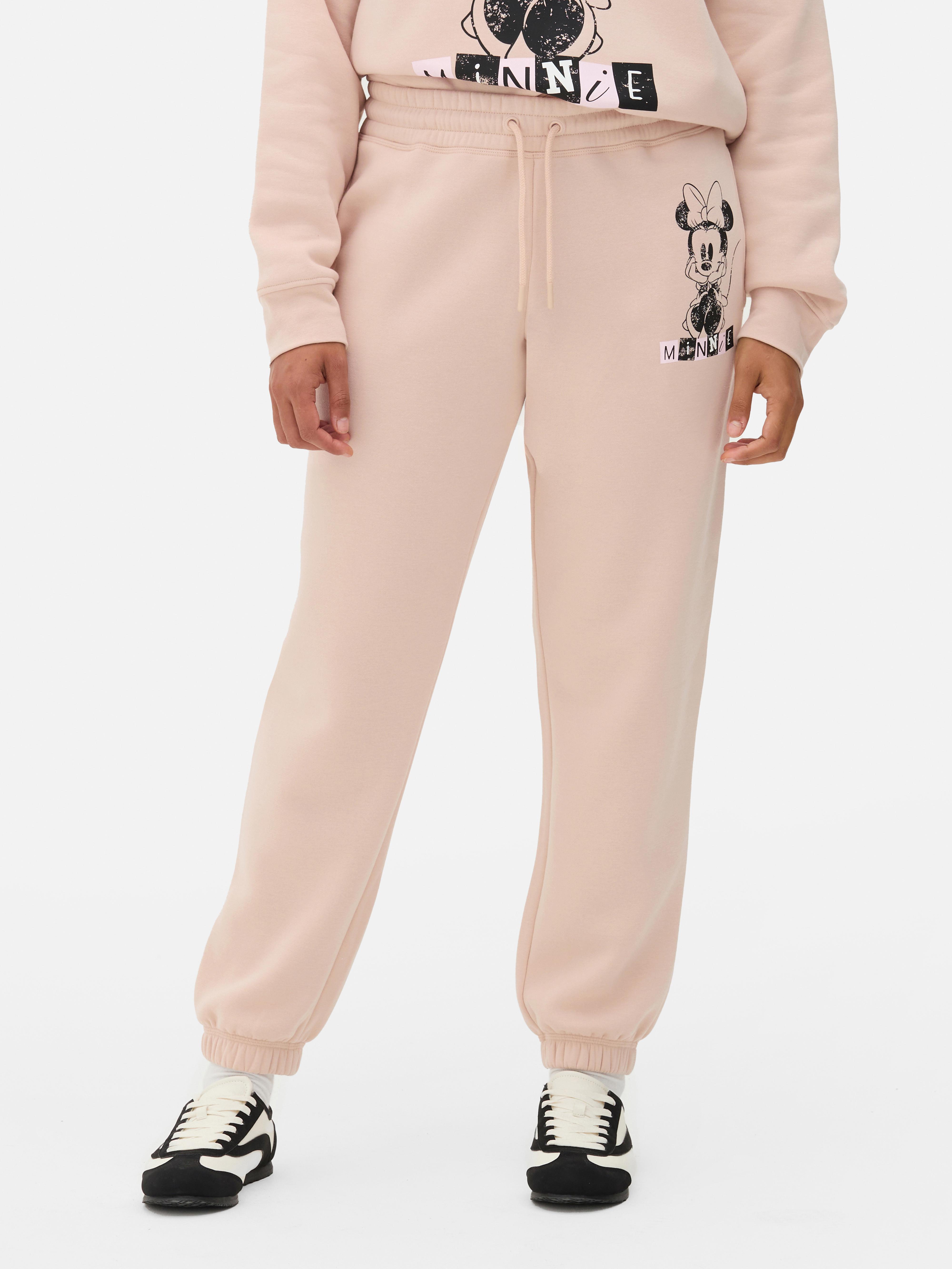 Pantaloni de trening asortați cu Minnie Mouse de la Disney. Pantaloni de trening Minnie Mouse cu un desen animat clasic și talie elastică.