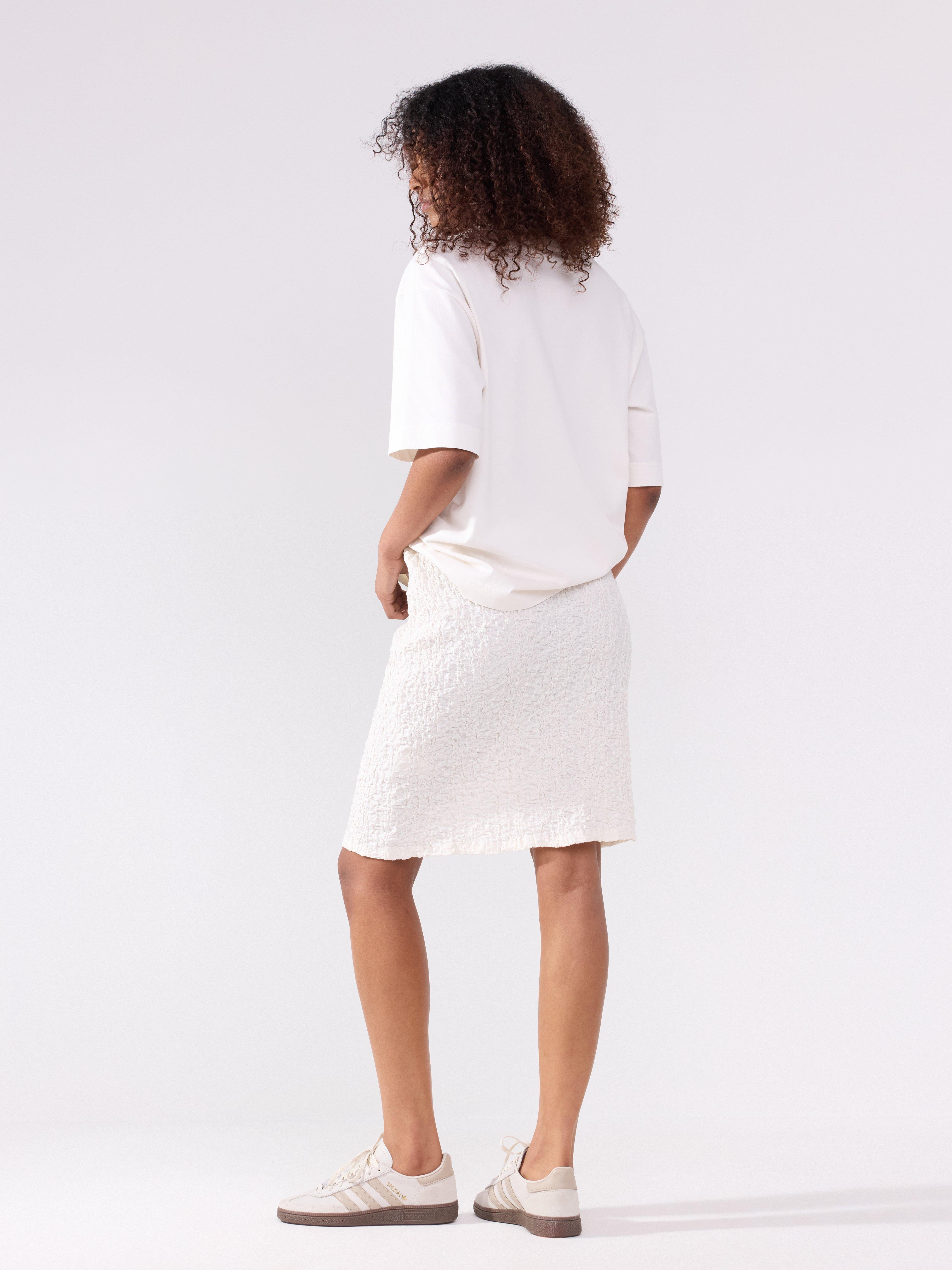 Minifalda texturizada color blanco roto