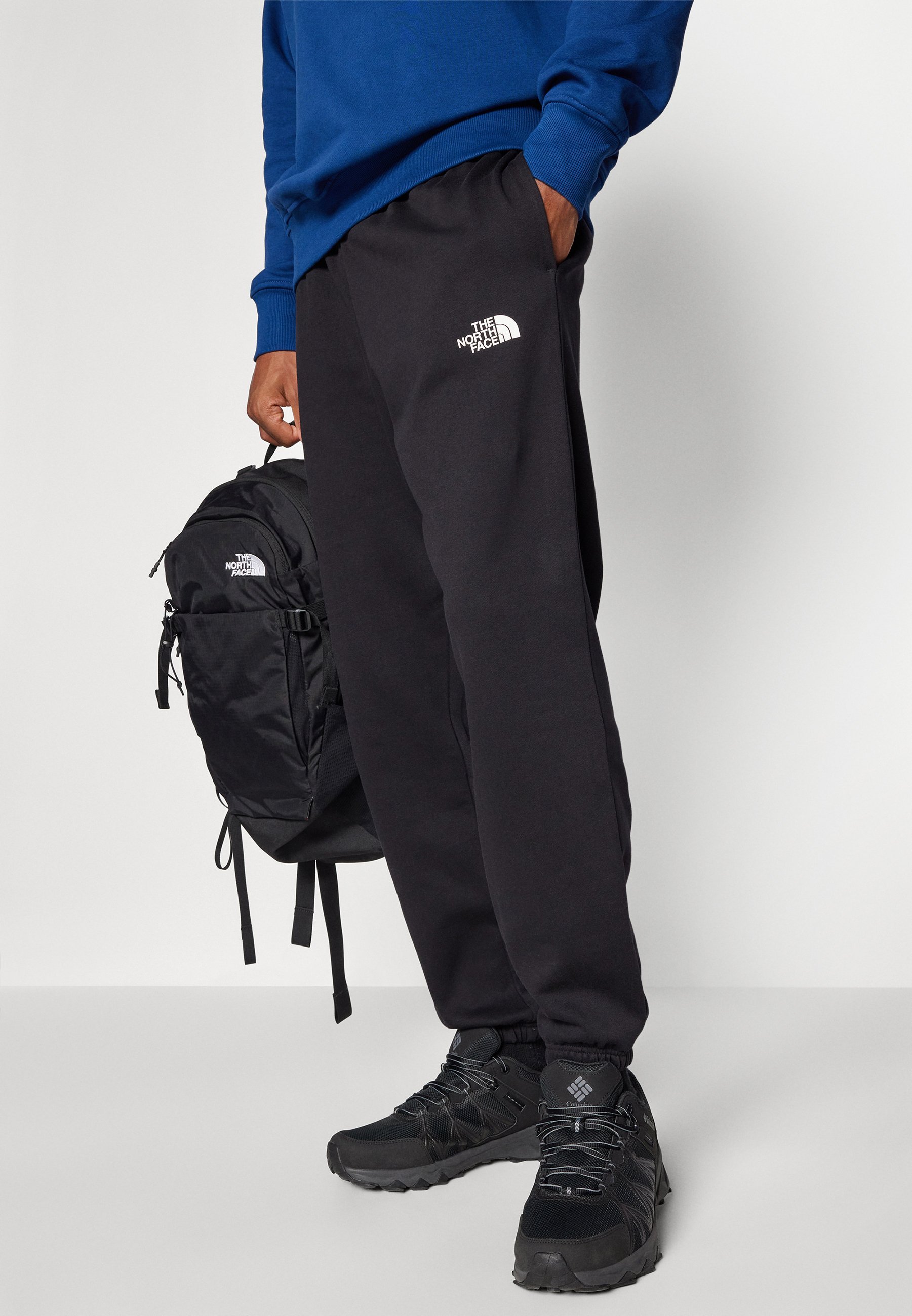 Pantaloni da tuta The North Face SIMPLE DOME REGULAR TAPERED JOGGER - neri