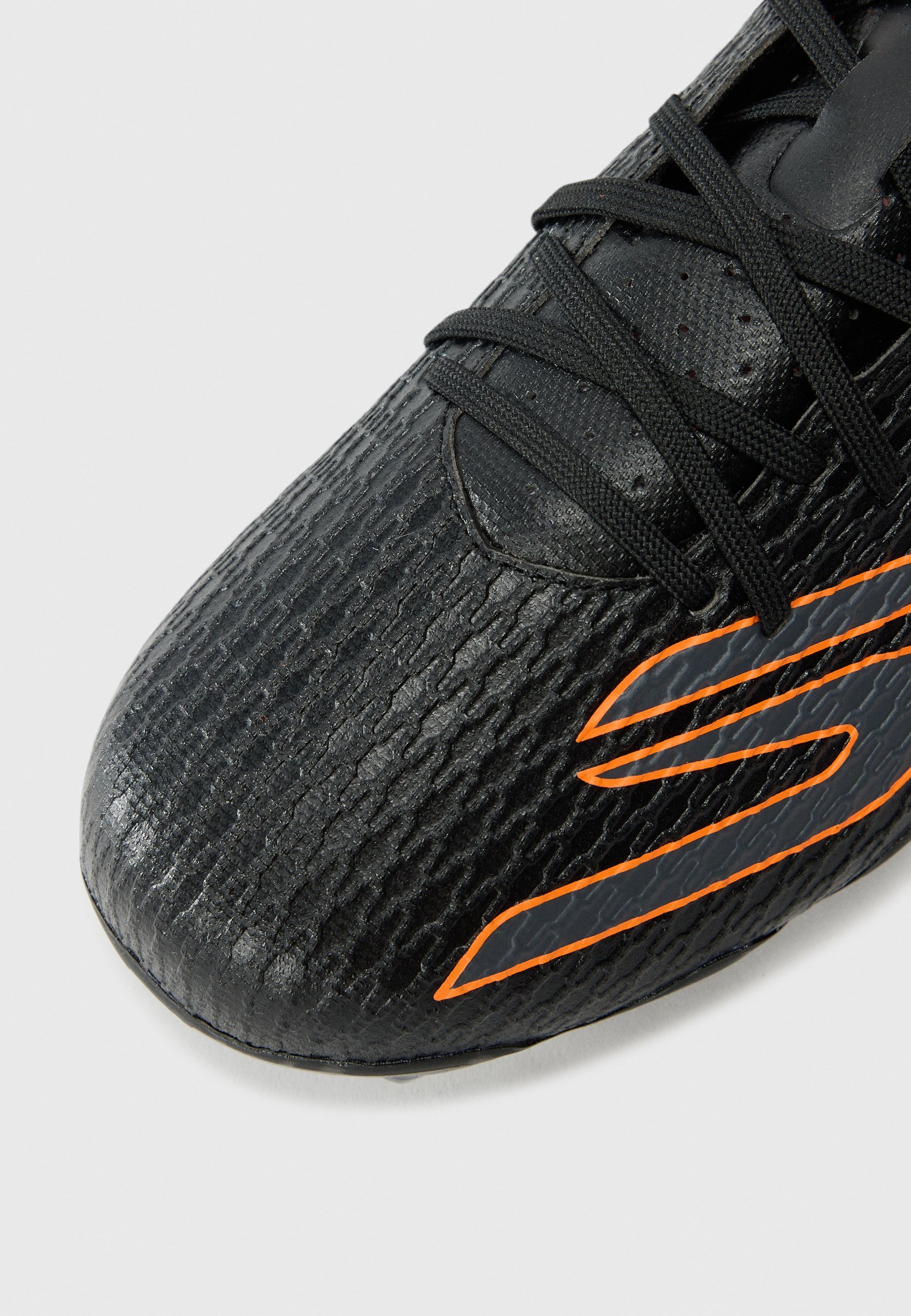 Skechers Performance SKECHERS JR YOUTH FG - Chaussures de football pour terrain souple - noir/orange