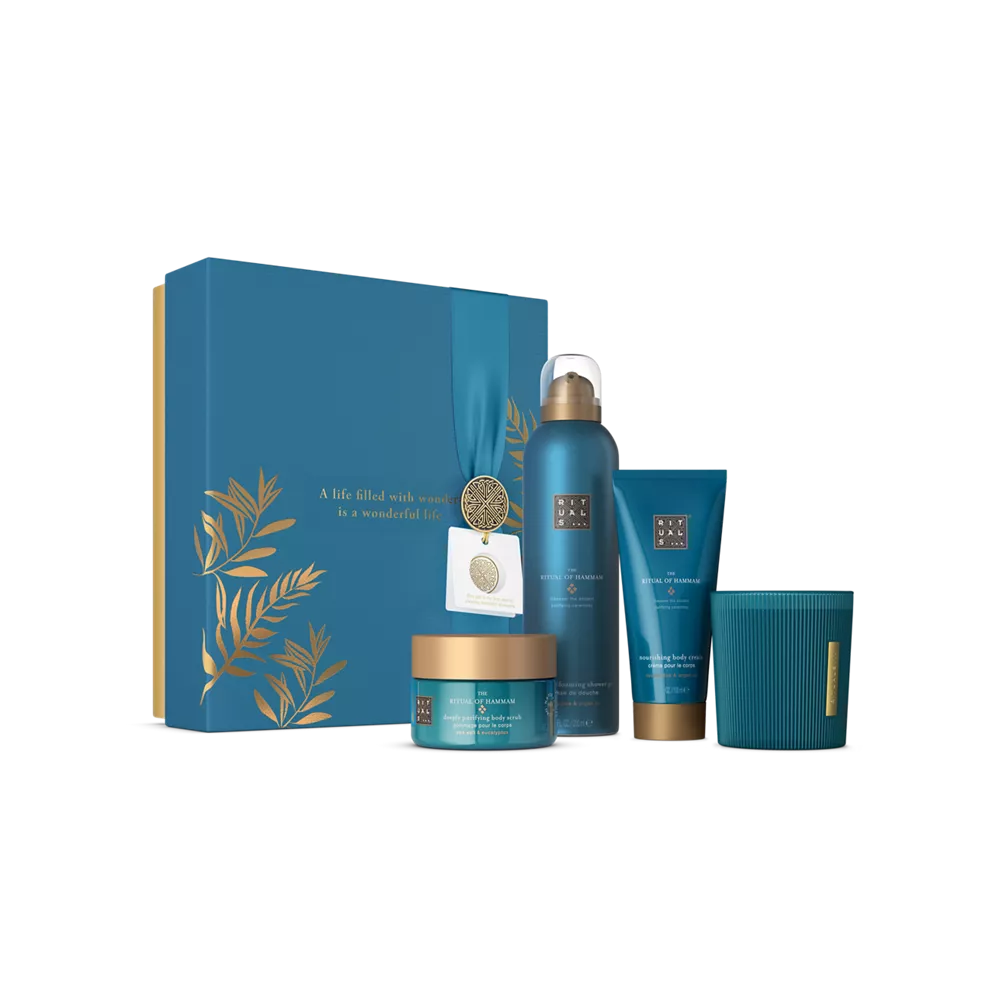 El set de regalo Ritual of Hammam M: gel de ducha espumoso 200 ml, crema corporal 100 ml, exfoliante corporal 125 g, vela aromática 140 g.