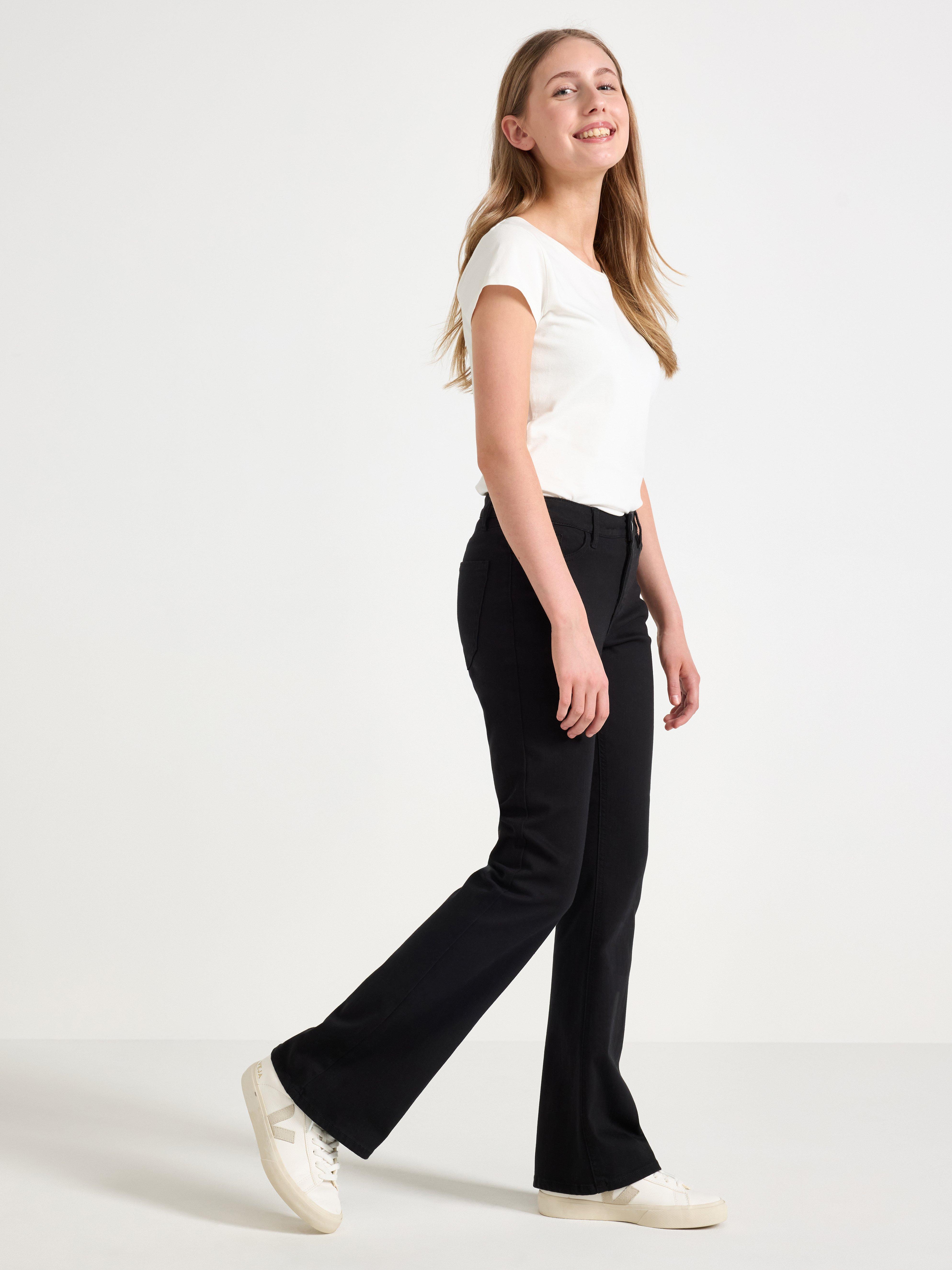 Pantalones vaqueros acampanados FREJA, súper elásticos, cintura normal, color negro.