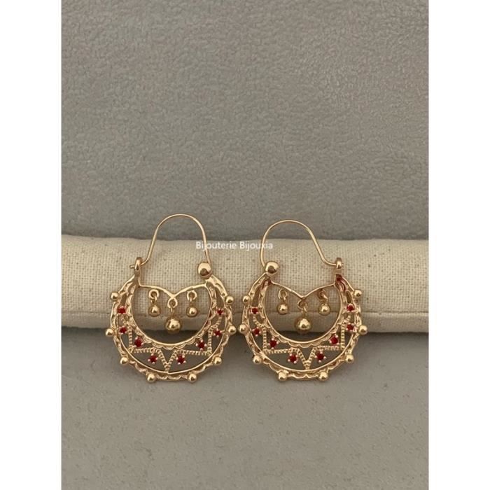 Pendientes criollos saboyanos con circonita cúbica y baño de oro de 18 quilates.